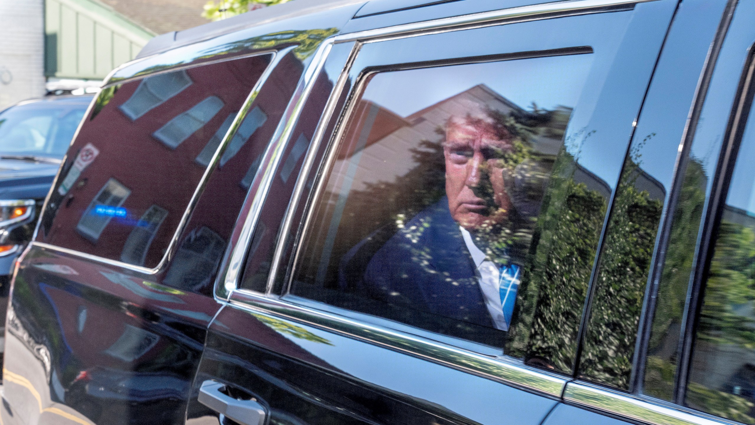 Former President Donald Trump arrives to the Capitol Hill Club, Thursday, June 13, 2024, in Washington. (AP Photo/Jacquelyn Martin)