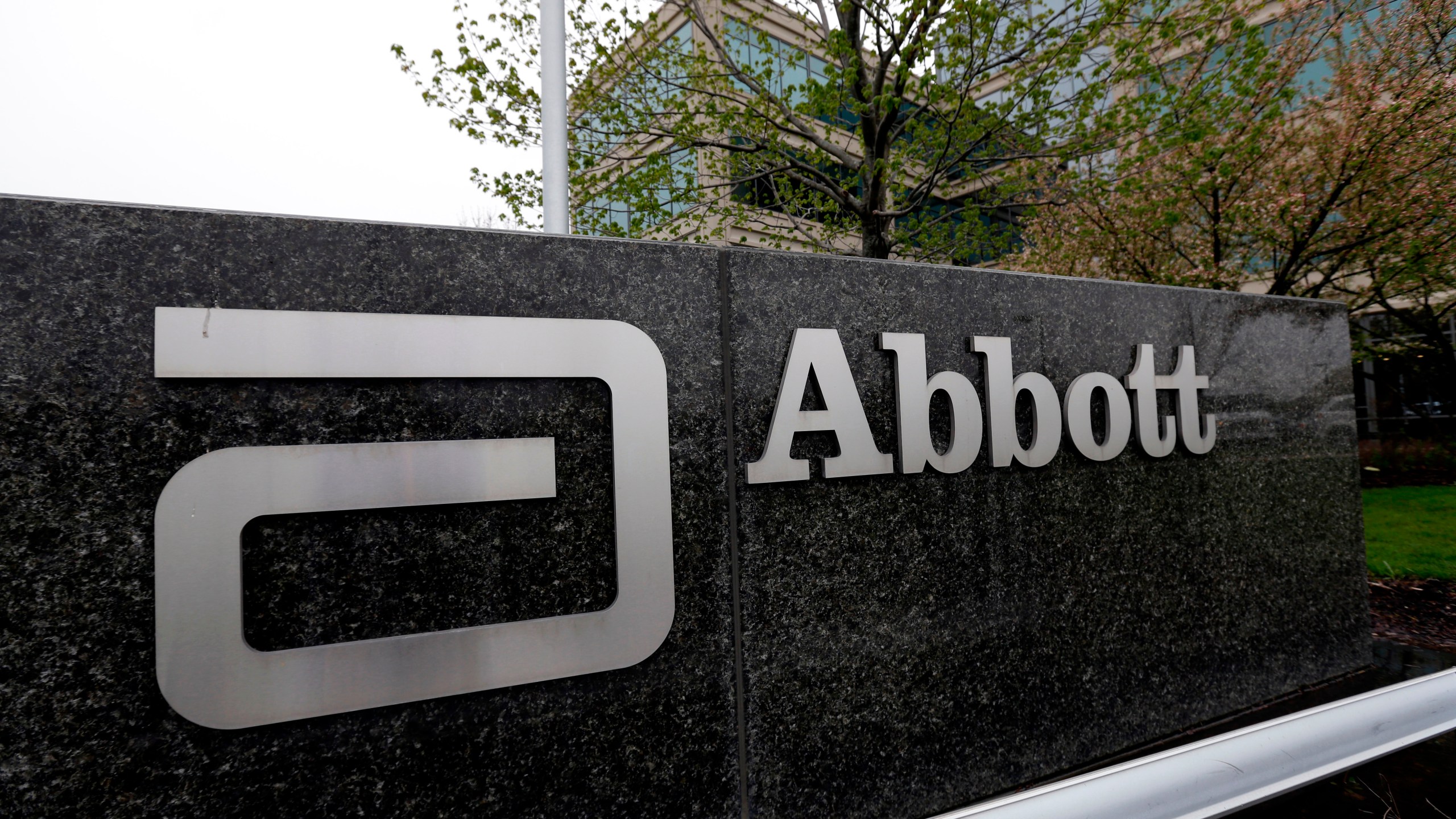 FILE - A sign at an Abbott Laboratories campus facility is displayed, April 28, 2016, in Lake Forest, Ill. A report released on Thursday, June 13, 2024, says the U.S. Food and Drug Administration took more than 15 months to act on a whistleblower complaint it received about conditions at an Abbott Nutrition factory that was at the center of a nationwide shortage of infant formula. (AP Photo/Nam Y. Huh, File)