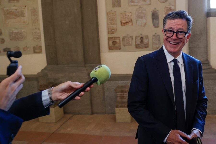 CAPTION CORRECTS LOCATION Stephen Colbert is interviewed after an audience with Pope Francis in Clementine Hall at The Vatican, Friday, June 14, 2024. Pope Francis is meeting with over 100 comedians from 15 countries aiming to establish a link between the Catholic Church and comic artists. (AP Photo/Riccardo De Luca)