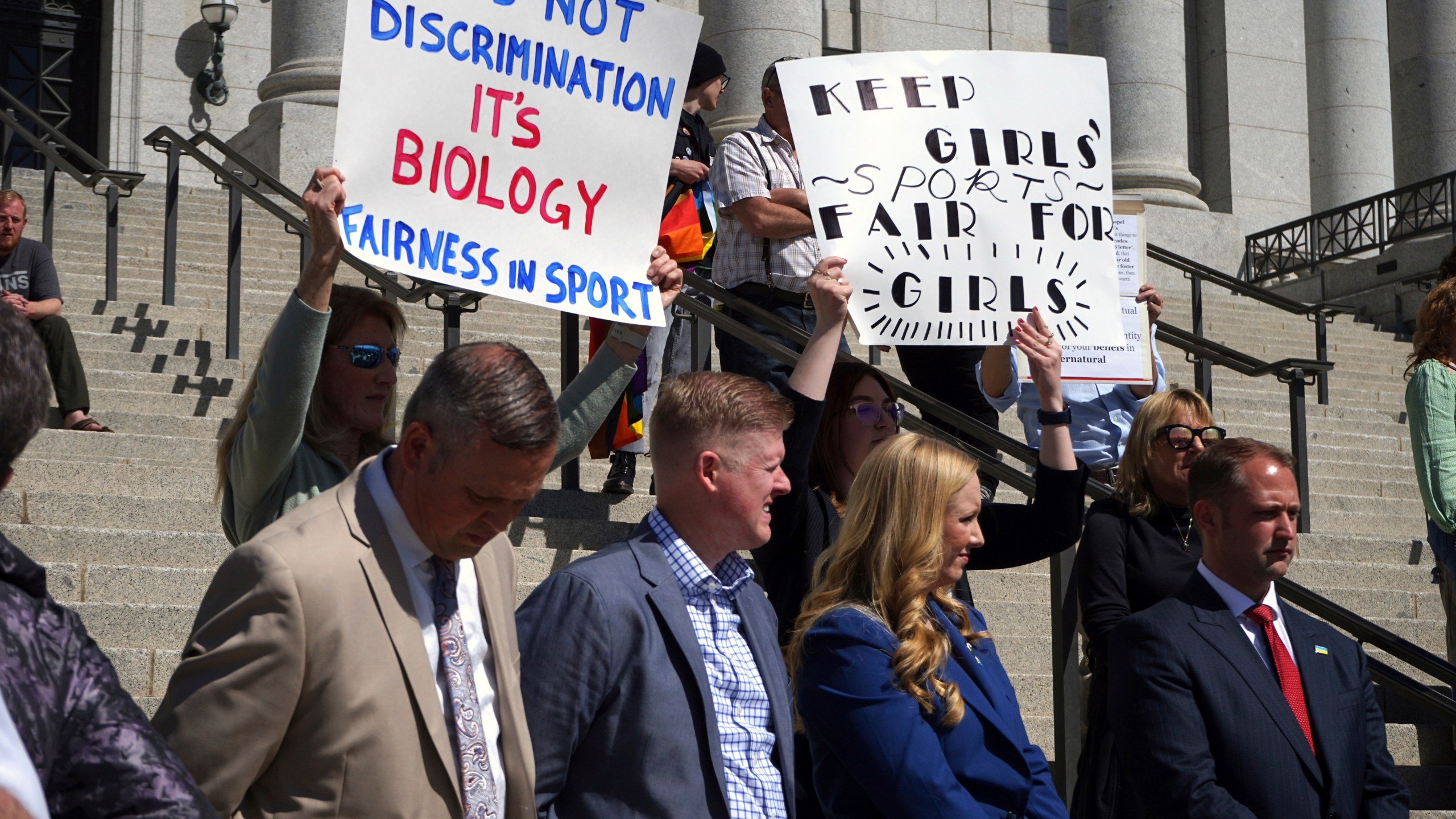 FILE - Lawmakers listen as parents speak about the prospect of their children competing against transgender girls in school sports at the Utah State Capitol on March 25, 2022, in Salt Lake City. A federal judge on Monday, June 17, 2024 temporarily blocked the Biden administration’s new Title IX rule expanding protections for LGBTQ+ students in six additional states, dealing another setback for a new policy that has been under legal attack by Republican attorneys general. (AP Photo/Samuel Metz, File)