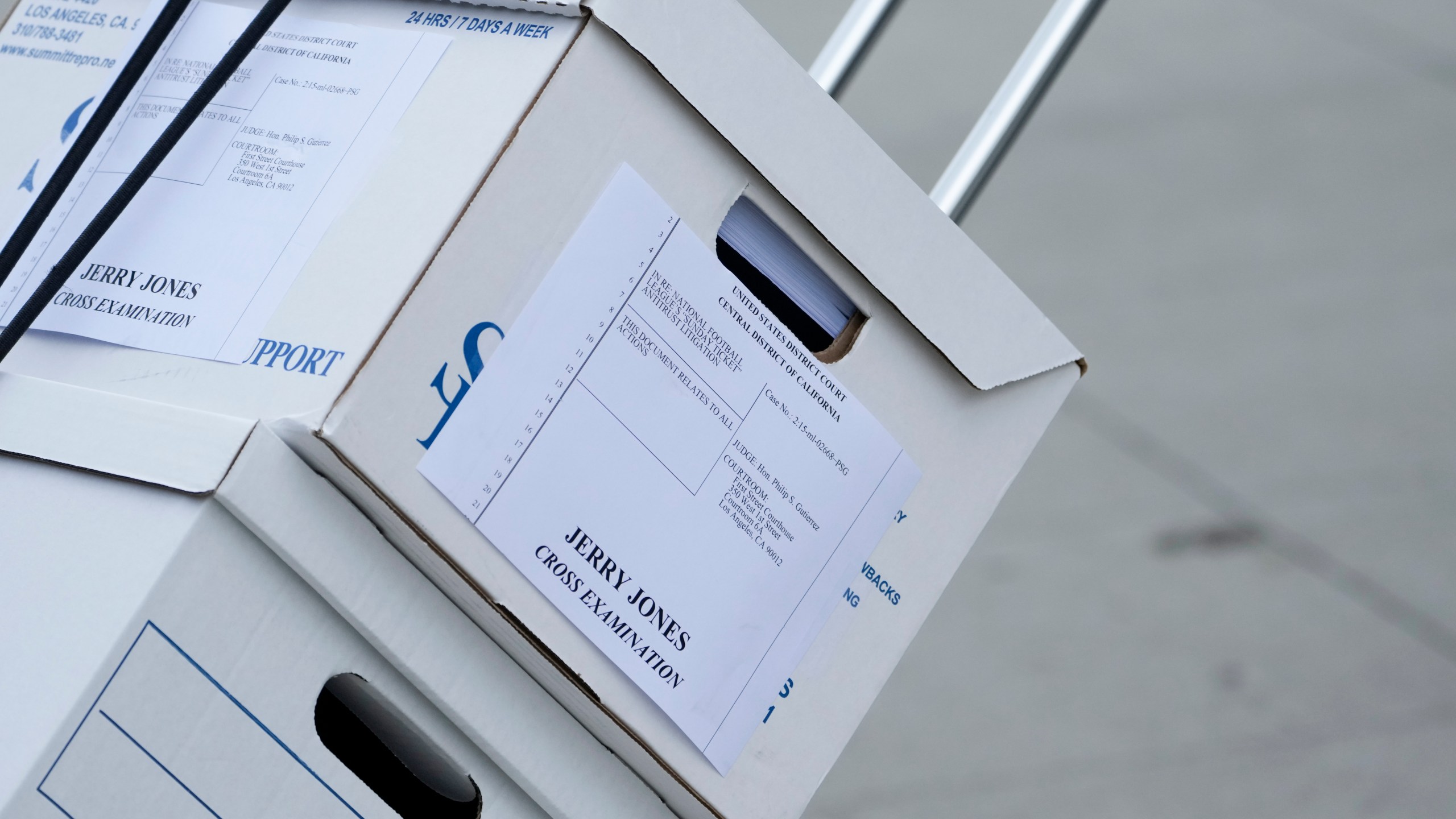 Documents to support Dallas Cowboys owner Jerry Jones' testimony are wheeled into federal court Tuesday, June 18, 2024, in Los Angeles. Jones is testifying in a class-action lawsuit filed by "Sunday Ticket" subscribers claiming the NFL broke antitrust laws. (AP Photo/Damian Dovarganes)