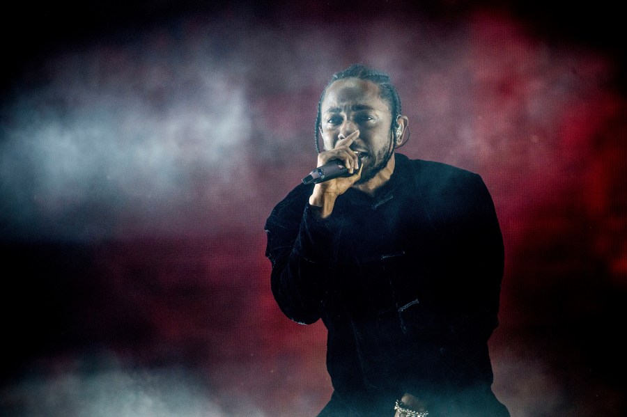 FILE - Kendrick Lamar performs at Coachella Music & Arts Festival at the Empire Polo Club on Sunday, April 16, 2017, in Indio, Calif. Kendrick Lamar turned his Juneteenth “Pop Out” concert into a celebration of Los Angeles unity. The 37-year-old rapper curated a three-hour livestreamed concert featuring a mix of up-and-coming LA rappers and stars including Dr. Dre and Tyler, The Creator. (Photo by Amy Harris/Invision/AP, File)