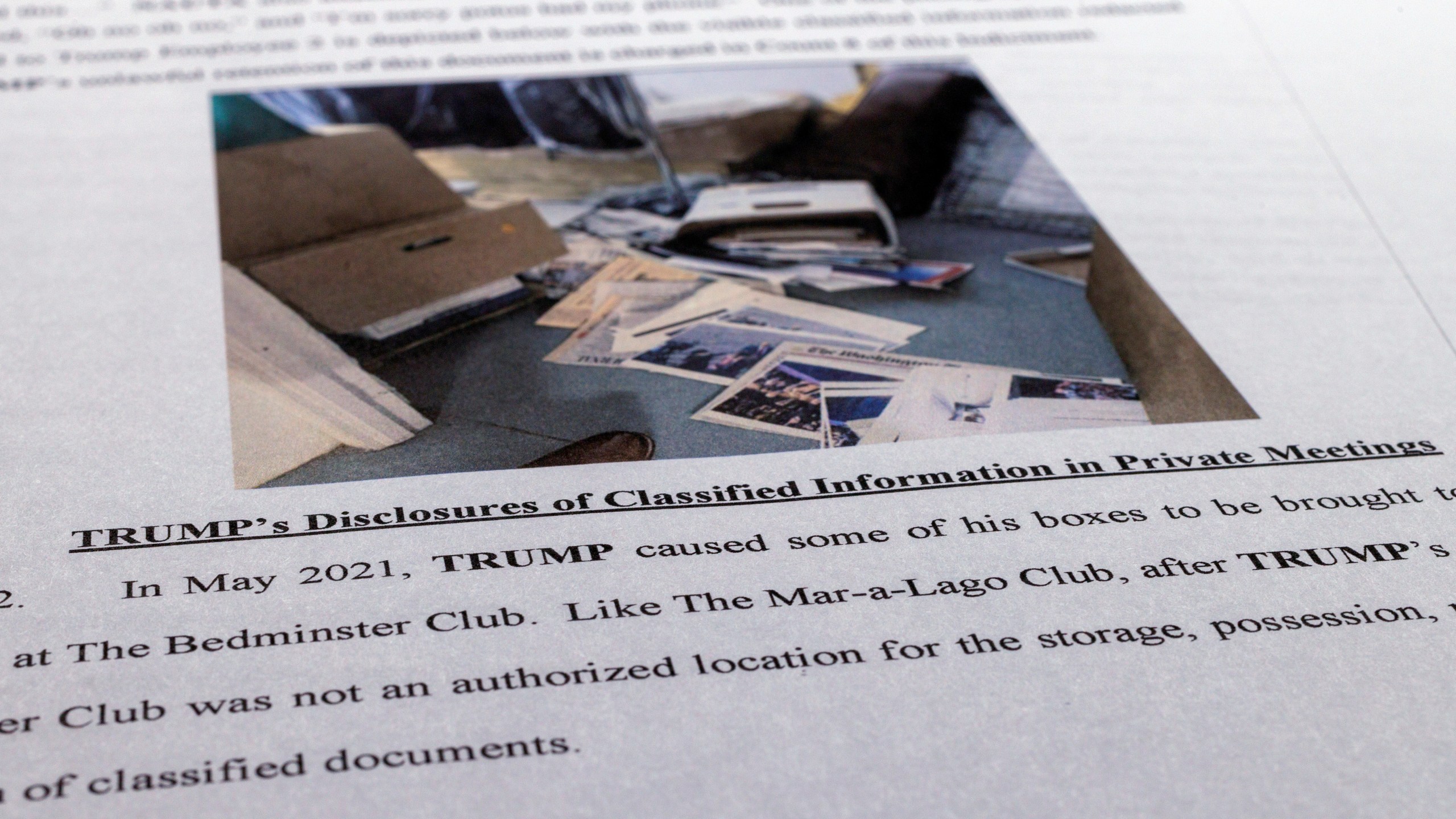 FILE - The indictment against former President Donald Trump is photographed on Friday, June 9, 2023. The federal judge presiding over the classified documents case against former President Donald Trump is hearing arguments Friday, June 21, 2024, on a long-shot defense effort to get the indictment thrown out based on the claim that the prosecutor who brought the charges was illegally appointed. (AP Photo/Jon Elswick, File)