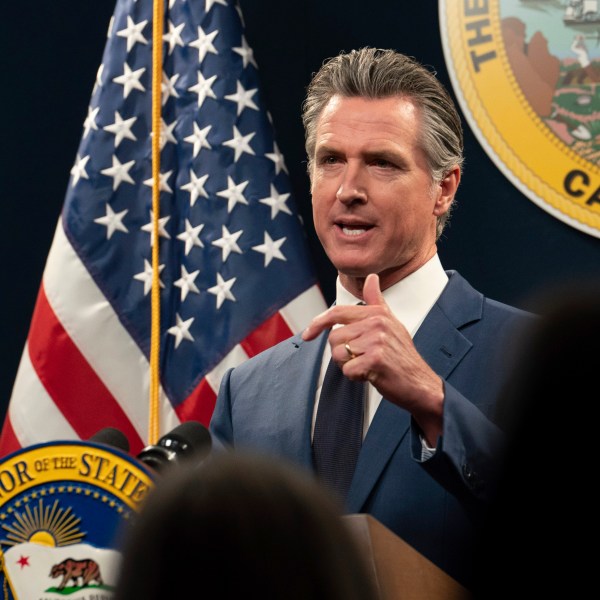 Gavin Newsom speaks at a press conference.