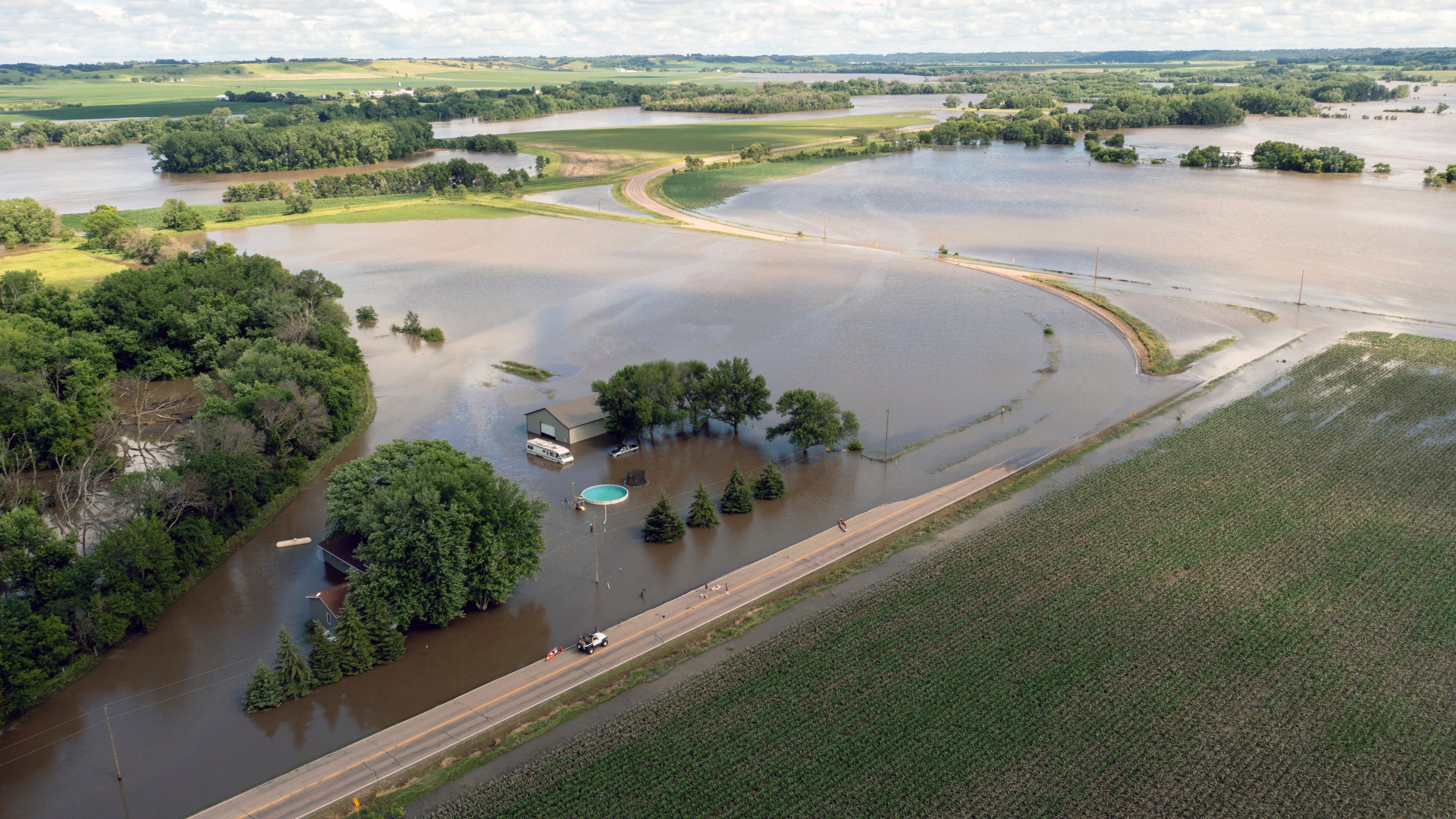 South Cedar Street is underwater after days of heavy rain led to flooding in the area, Saturday, June 22, 2024, south of Canton, S.D. (AP Photo/Josh Jurgens)