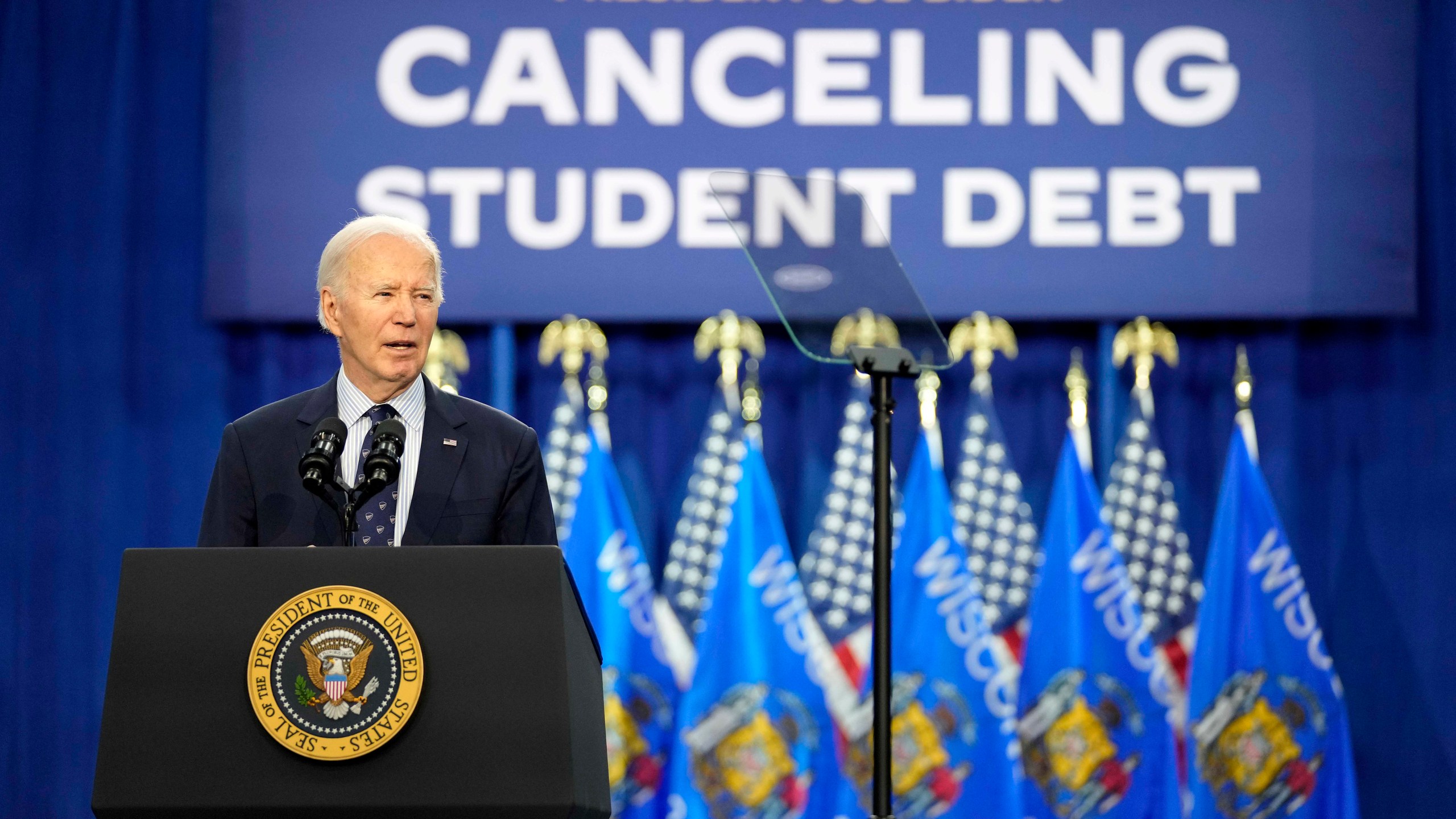 FILE - President Joe Biden speaks at an event about canceling student debt, at the Madison Area Technical College Truax campus, April 8, 2024, in Madison, Wis. Federal judges in Kansas and Missouri on Monday, June 24, blocked parts of a Biden administration student loan repayment plan that provides a faster path to cancellation and lower monthly payments for millions of borrowers. (AP Photo/Kayla Wolf, File)