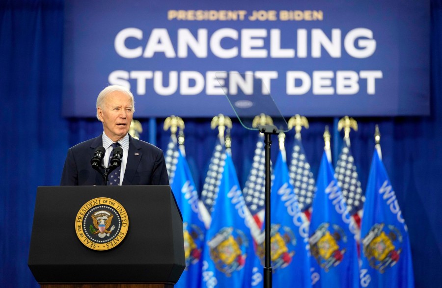 FILE - President Joe Biden speaks at an event about canceling student debt, at the Madison Area Technical College Truax campus, April 8, 2024, in Madison, Wis. Federal judges in Kansas and Missouri on Monday, June 24, blocked parts of a Biden administration student loan repayment plan that provides a faster path to cancellation and lower monthly payments for millions of borrowers. (AP Photo/Kayla Wolf, File)