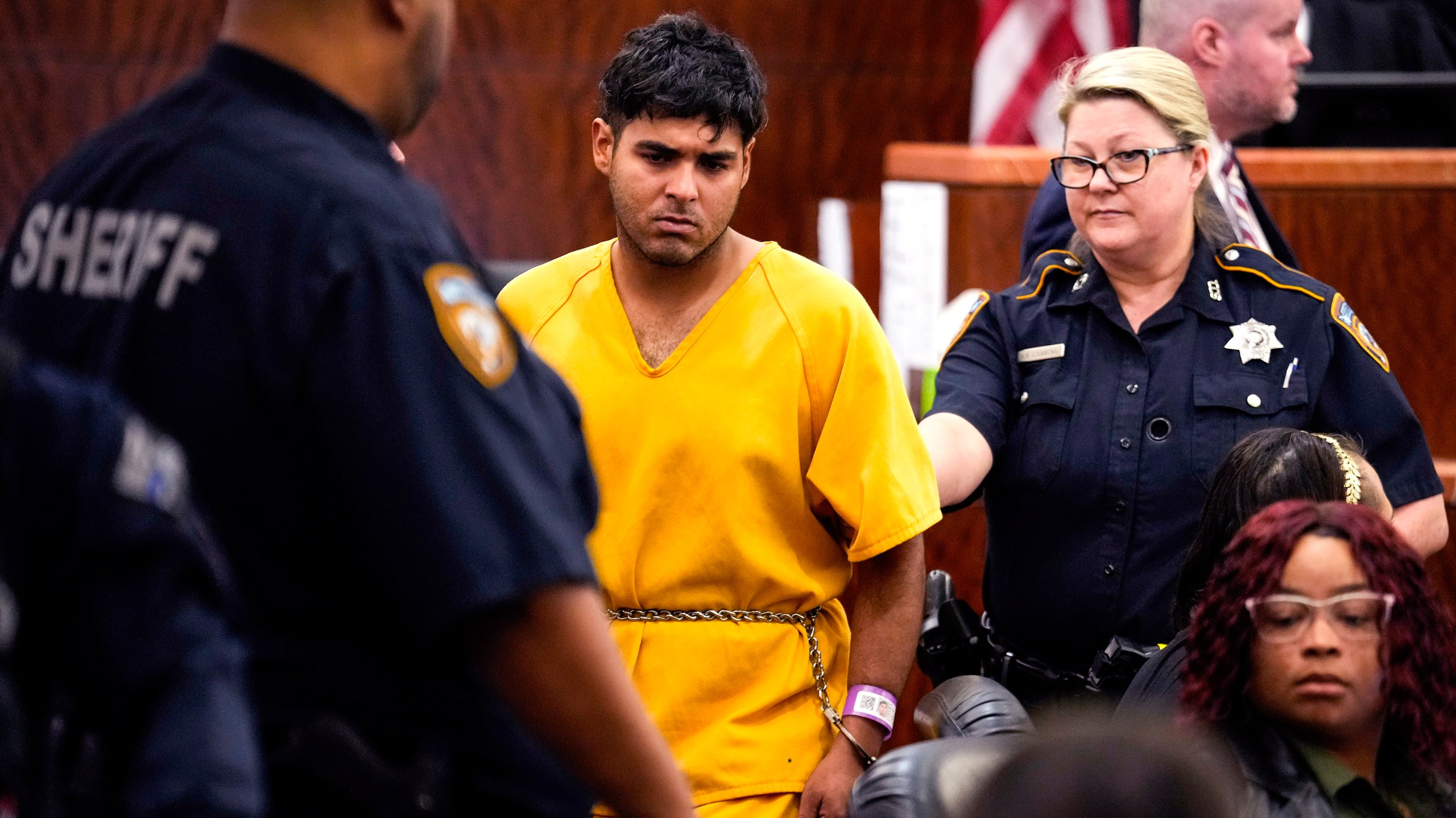 CORRECTS NAME: Johan Jose Martinez-Rangel, one of the two men accused of killing 12-year-old Jocelyn Nungaray, is led from the courtroom by deputies on Tuesday, June 25, 2024 in Houston. Capital murder charges have been filed against Martinez-Rangel and Franklin Jose Pena Ramos in the strangulation death of the 12-year-old. (Brett Coomer/Houston Chronicle via AP)