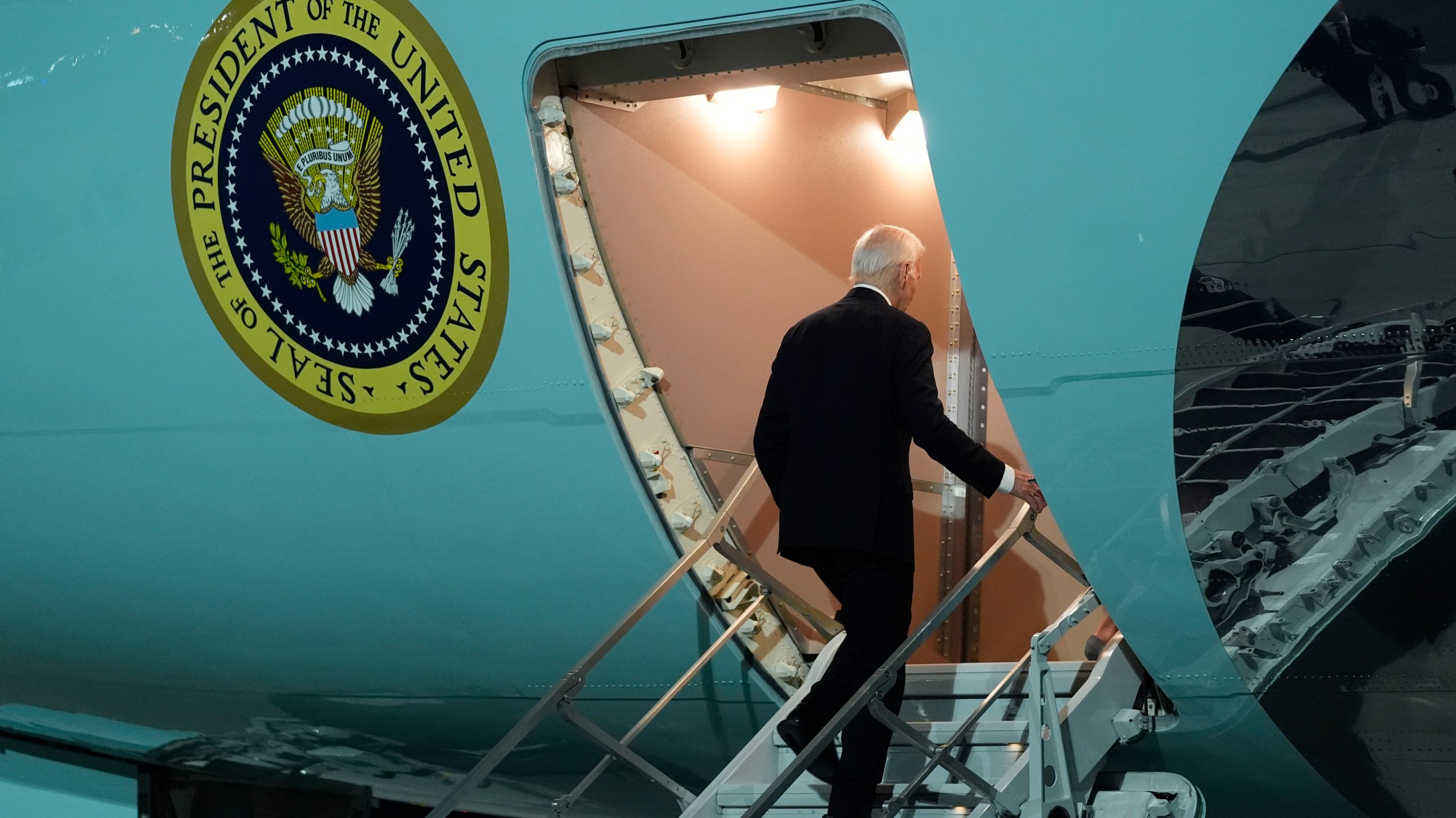 President Joe Biden boards Air Force One at Dobbins Air Reserve Base, Friday, June 28, 2024, in Marietta, Ga., after participating in a presidential debate in Atlanta on Thursday. (AP Photo/Evan Vucci)