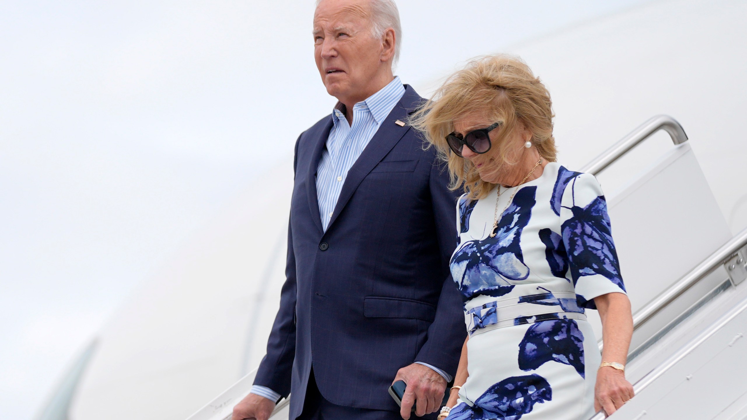 President Joe Biden, left, and first lady Jill Biden arrive at Francis S. Gabreski Airport, Saturday, June 29, 2024, in Westhampton Beach, N.Y. (AP Photo/Evan Vucci)