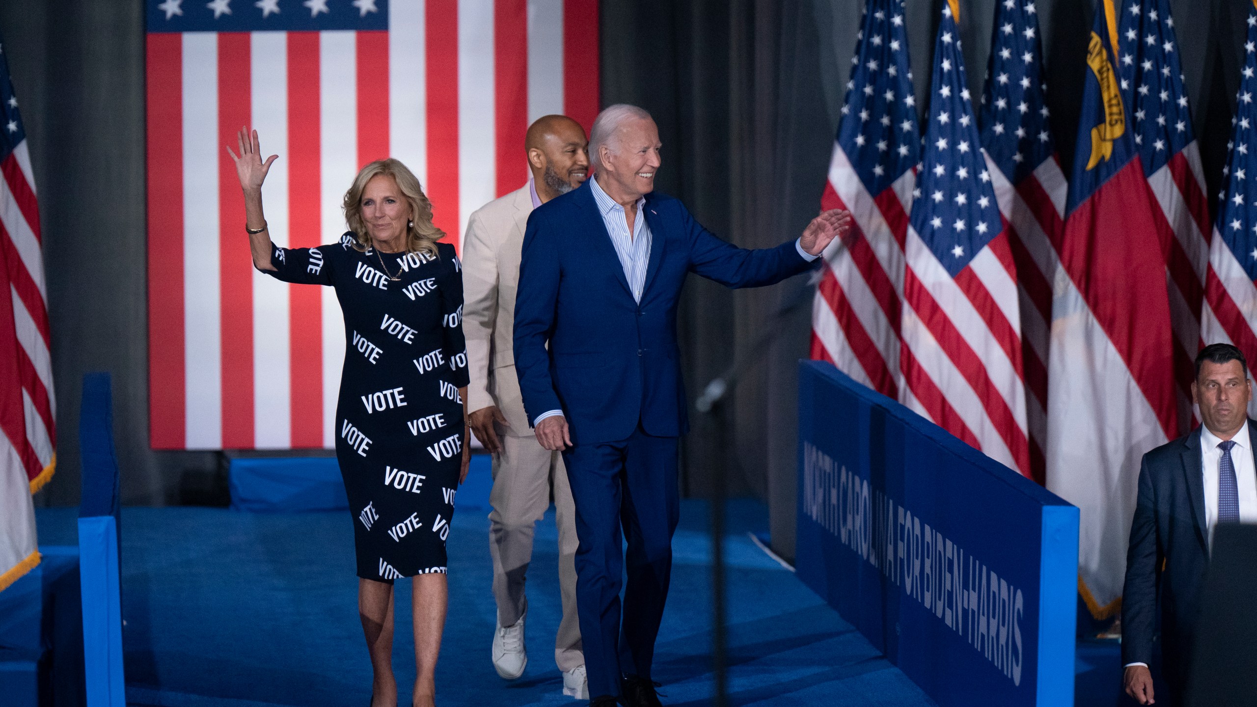 First Lady Jill Biden, with "VOTE" printed on her dress, and U.S. President Joe Biden arrive at a post-debate campaign rally last week in Raleigh, North Carolina.