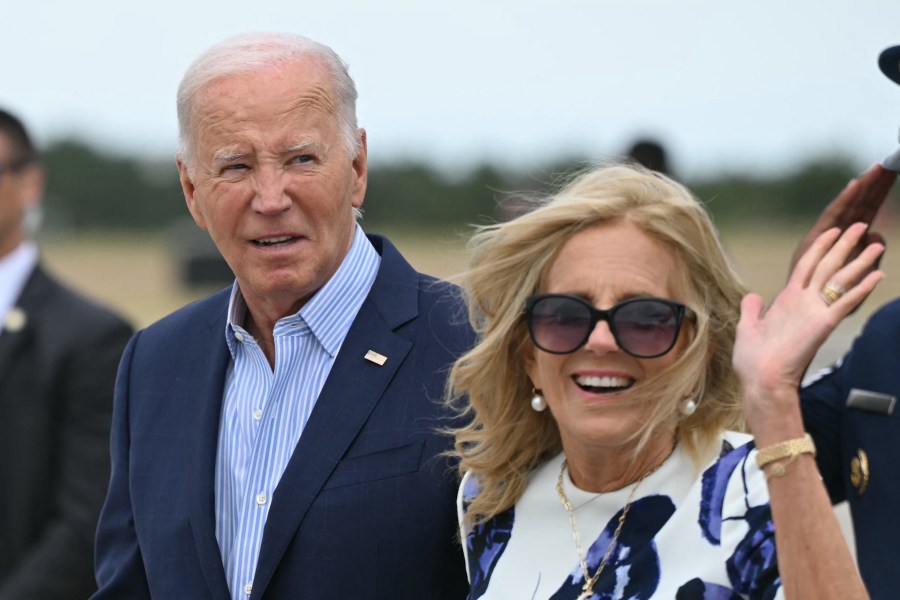 US President Joe Biden and First Lady Jill Biden step off Air Force One upon arrival at in Westhampton Beach, New York on Saturday.