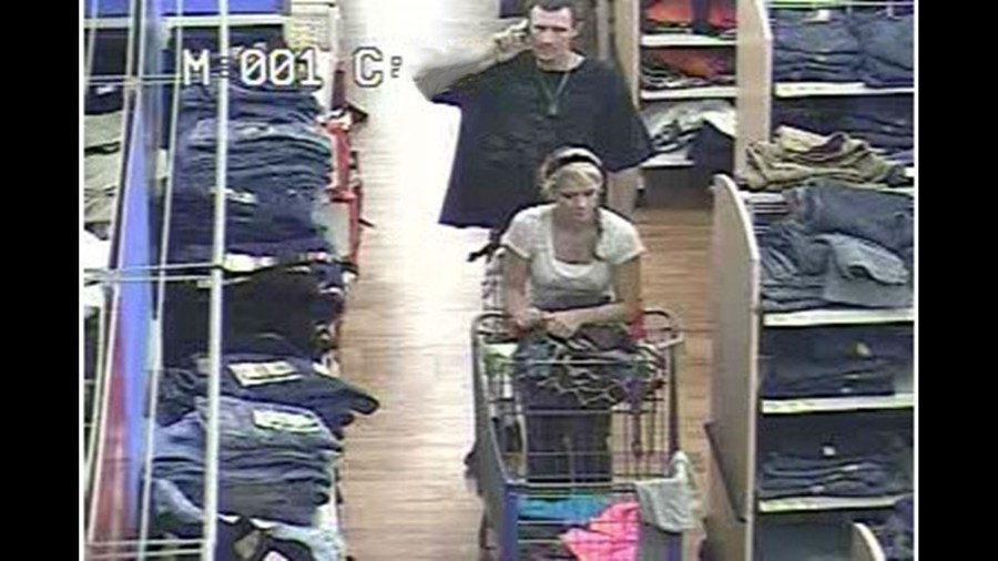 Security footage of Tiffany Whitton pushing a cart in a store.