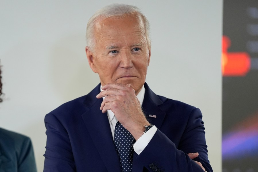 President Joe Biden listens during a visit to the D.C. Emergency Operations Center, Tuesday, July 2, 2024, in Washington. (AP Photo/Evan Vucci)