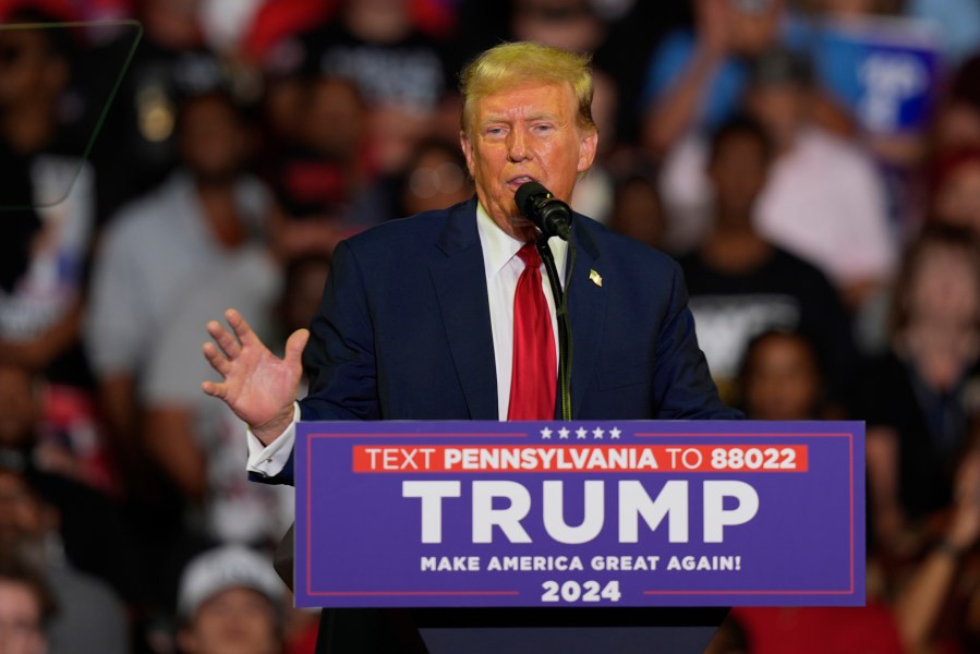 FILE - Republican presidential candidate former President Donald Trump speaks at a campaign rally, June 22, 2024, in Philadelphia. Trump is seeking to distance himself from a plan for a massive overhaul of the federal government drafted by some of his administration officials. Some of these men are expected to take high-level roles if the Republican presumptive nominee is elected back into the White House. Trump is saying on Truth Social that he "knew nothing about Project 2025." (AP Photo/Chris Szagola, File)