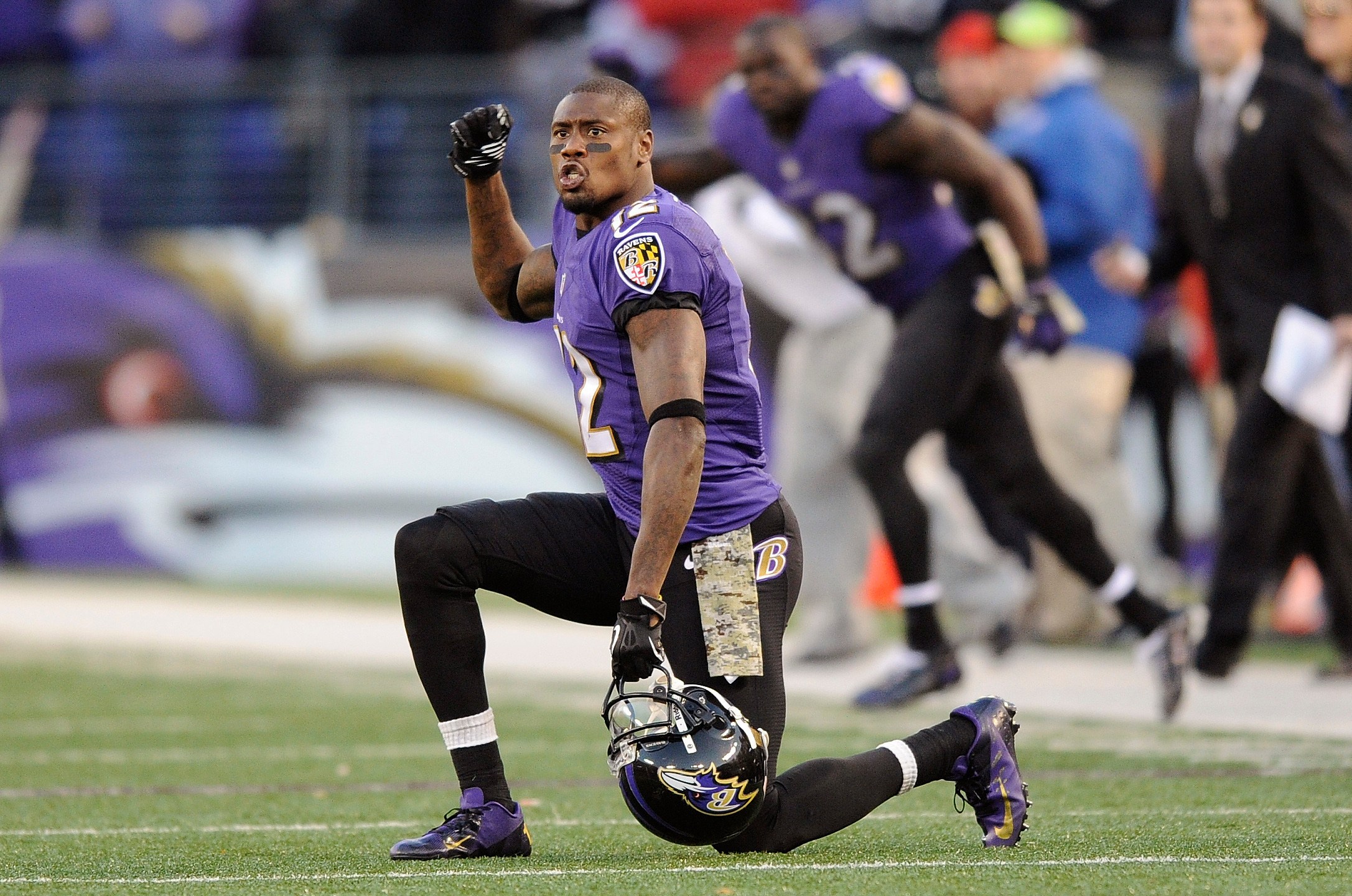 FILE - In this Nov. 10, 2013 file photo, Baltimore Ravens wide receiver Jacoby Jones cheers in overtime of an NFL football game against the Cincinnati Bengals in Baltimore. The Houston Texans, Jones' team for the first five seasons of his career, announced his death Sunday, July 14, 2024. He was 40. (AP Photo/Nick Wass, File)