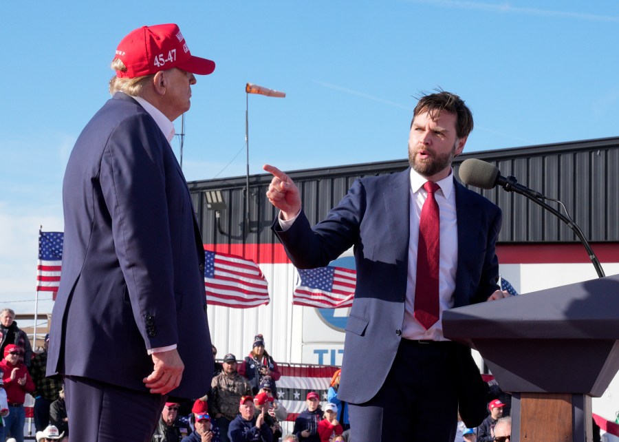 FILE - Sen. J.D. Vance, R-Ohio, right, points toward Republican presidential candidate former President Donald Trump at a campaign rally, March 16, 2024, in Vandalia, Ohio. Trump says Ohio Sen. JD Vance will be his vice presidential pick. He says on his Truth Social Network that, “After lengthy deliberation and thought, and considering the tremendous talents of many others, I have decided that the person best suited to assume the position of Vice President of the United States is Senator J.D. Vance of the Great State of Ohio.” (AP Photo/Jeff Dean, File)