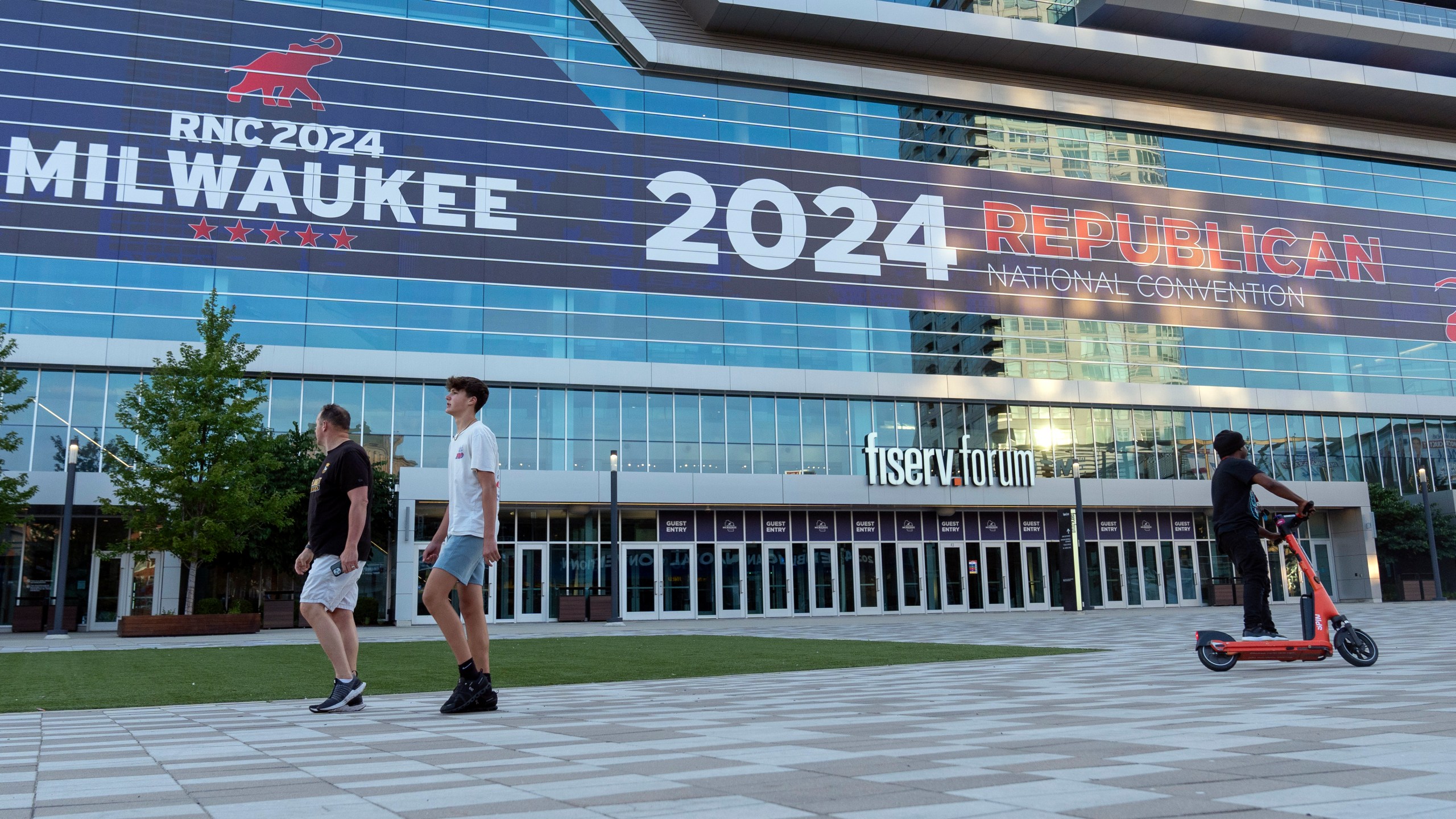 People walk at the Fiserv Forum ahead of the 2024 Republican National Convention, Thursday, July 11, 2024, in Milwaukee. (AP Photo/Alex Brandon)