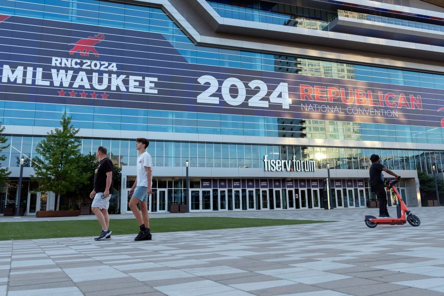 People walk at the Fiserv Forum ahead of the 2024 Republican National Convention, Thursday, July 11, 2024, in Milwaukee. (AP Photo/Alex Brandon)