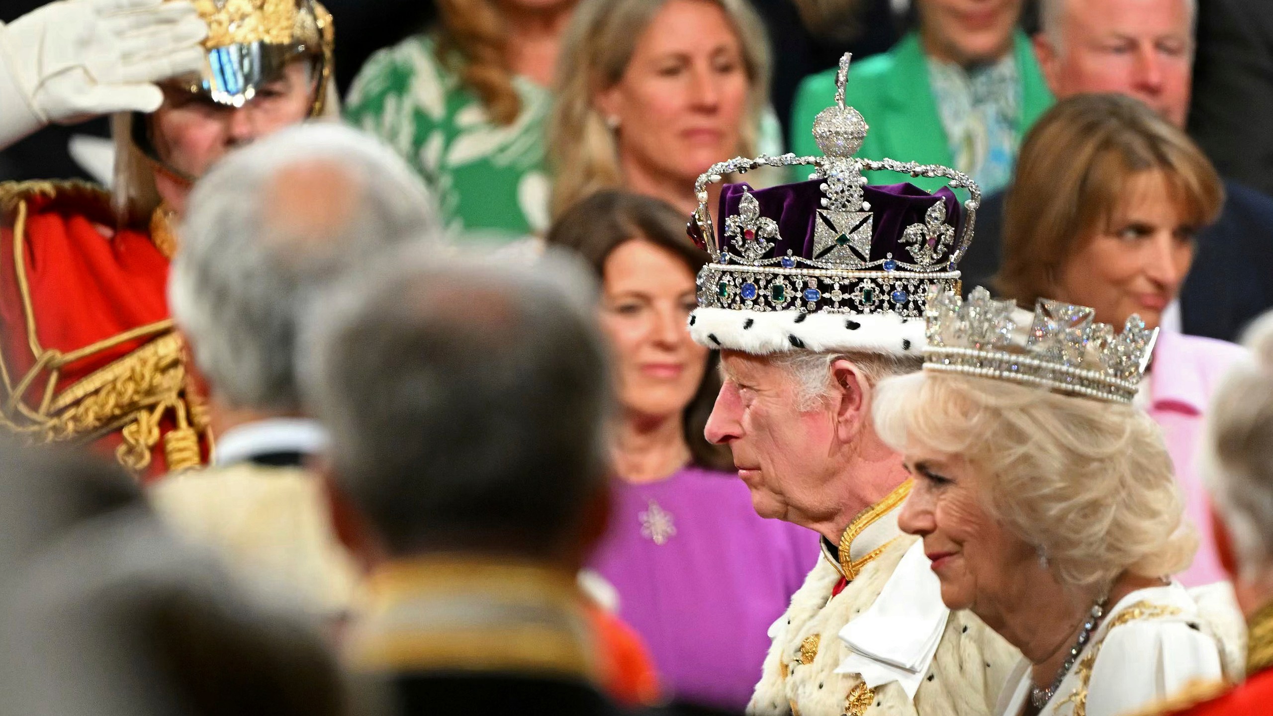 Britain's King Charles III wearing the Imperial State Crown and Britain's Queen Camilla, wearing the George IV State Diadem, attend the State Opening of Parliament, at the Houses of Parliament, in London, Wednesday, July 17, 2024. (Justin Tallis/POOL via AP)