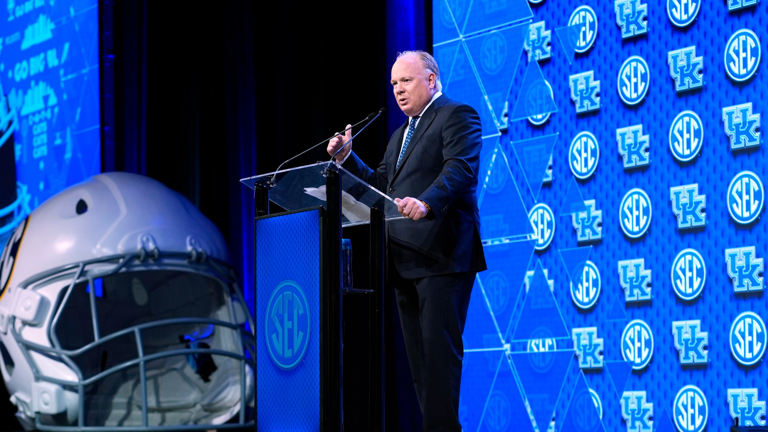 Kentucky head football coach Mark Stoops speaks during the Southeastern Conference NCAA college football media days Thursday, July 18, 2024, in Dallas. (AP Photo/LM Otero)