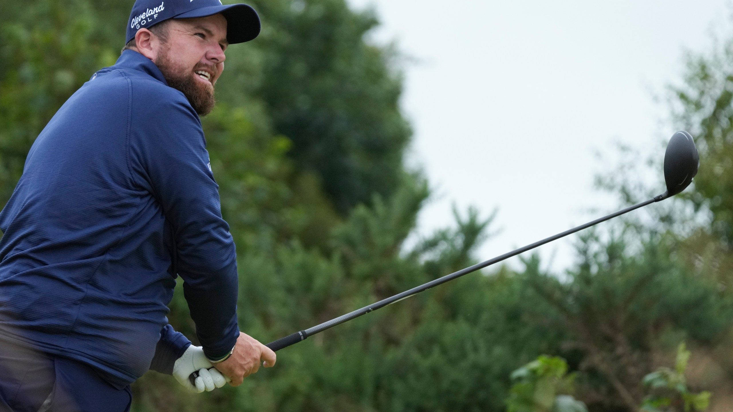 Shane Lowry of Ireland hits off the 12th tee during his opening round of the British Open Golf Championships at Royal Troon golf club in Troon, Scotland, Thursday, July 18, 2024. (AP Photo/Jon Super)