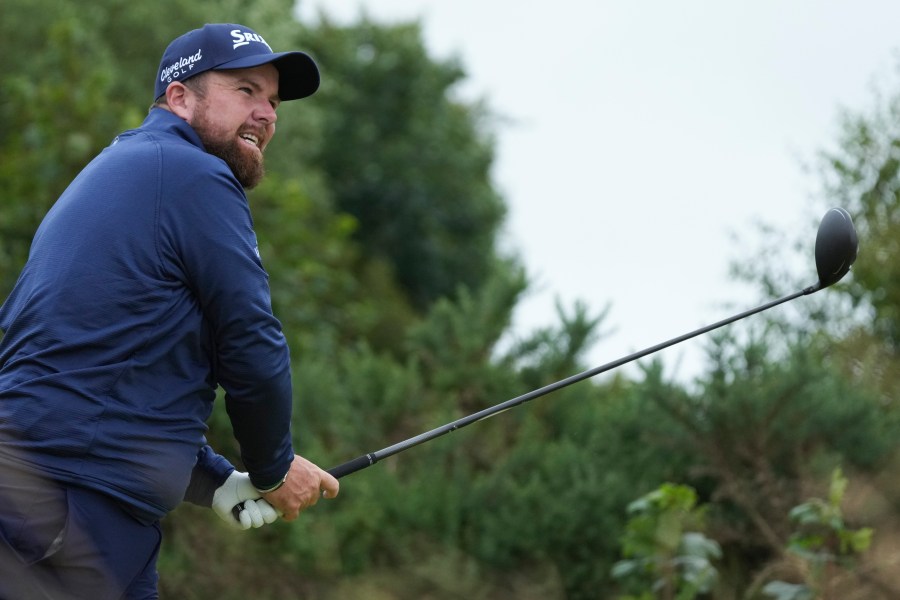 Shane Lowry of Ireland hits off the 12th tee during his opening round of the British Open Golf Championships at Royal Troon golf club in Troon, Scotland, Thursday, July 18, 2024. (AP Photo/Jon Super)