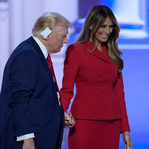 Republican presidential candidate former President Donald Trump is joined on stage by former first lady Melania Trump at the Republican National Convention Thursday, July 18, 2024, in Milwaukee. (AP Photo/J. Scott Applewhite)