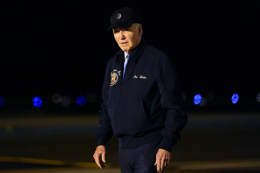 President Joe Biden walks to his car after stepping off of Air Force One at Dover Air Force Base in Delaware, Wednesday, July 17, 2024. Biden is returning to his home in Rehoboth Beach, Del., to self-isolate after testing positive for COVID-19. (AP Photo/Susan Walsh)