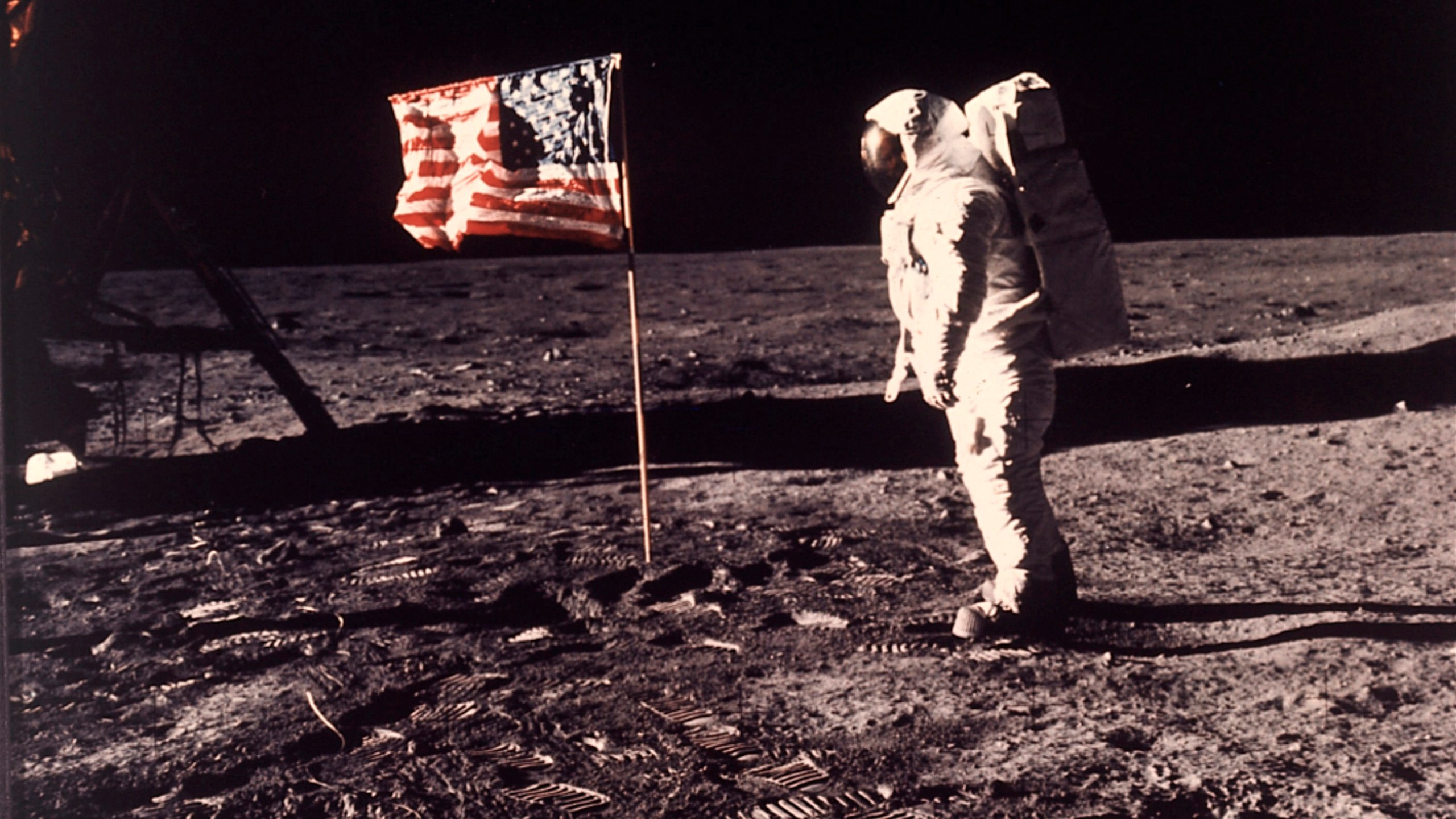 FILE - In this photo provided by NASA, astronaut Edwin "Buzz" Aldrin poses for a photograph beside the U.S. flag deployed on the moon during the Apollo 11 mission on July 20, 1969. (Neil Armstrong/NASA via AP, File)