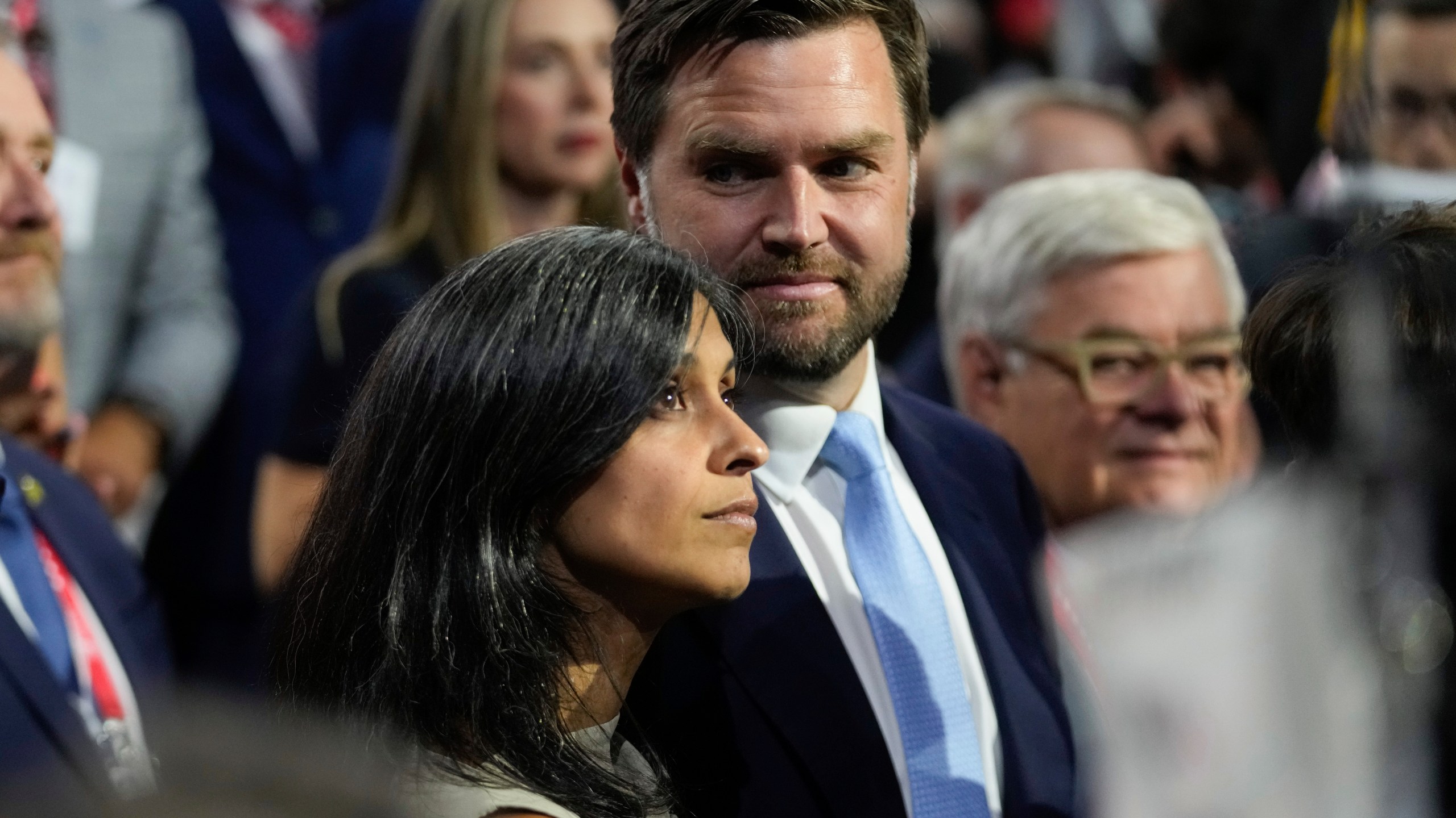 Republican vice presidential candidate Sen. JD Vance arrives with his wife Usha Chilukuri Vance at the Republican National Convention Monday, July 15, 2024, in Milwaukee. (AP Photo/Paul Sancya)