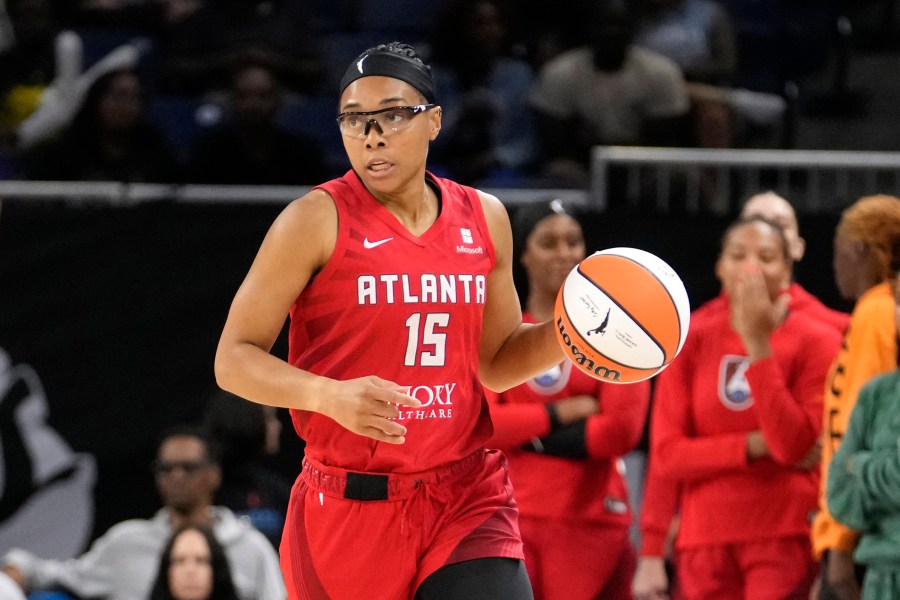 FILE - Atlanta Dream's Allisha Gray advances the ball during a WNBA basketball game against the Chicago Sky on Wednesday, July 10, 2024, in Chicago. Gray became the first player in WNBA history to win both the 3-point and skills competition in the same year, capturing both titles Friday, July 19.(AP Photo/Charles Rex Arbogast, File)