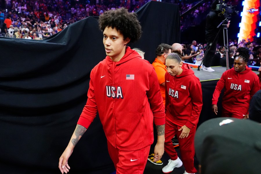 Brittney Griner, left, Diana Taurasi, and Chelsea Gray, of Team USA, walk on the court prior to a WNBA All-Star basketball game against Team WNBA, Saturday, July 20, 2024, in Phoenix. (AP Photo/Ross D. Franklin)