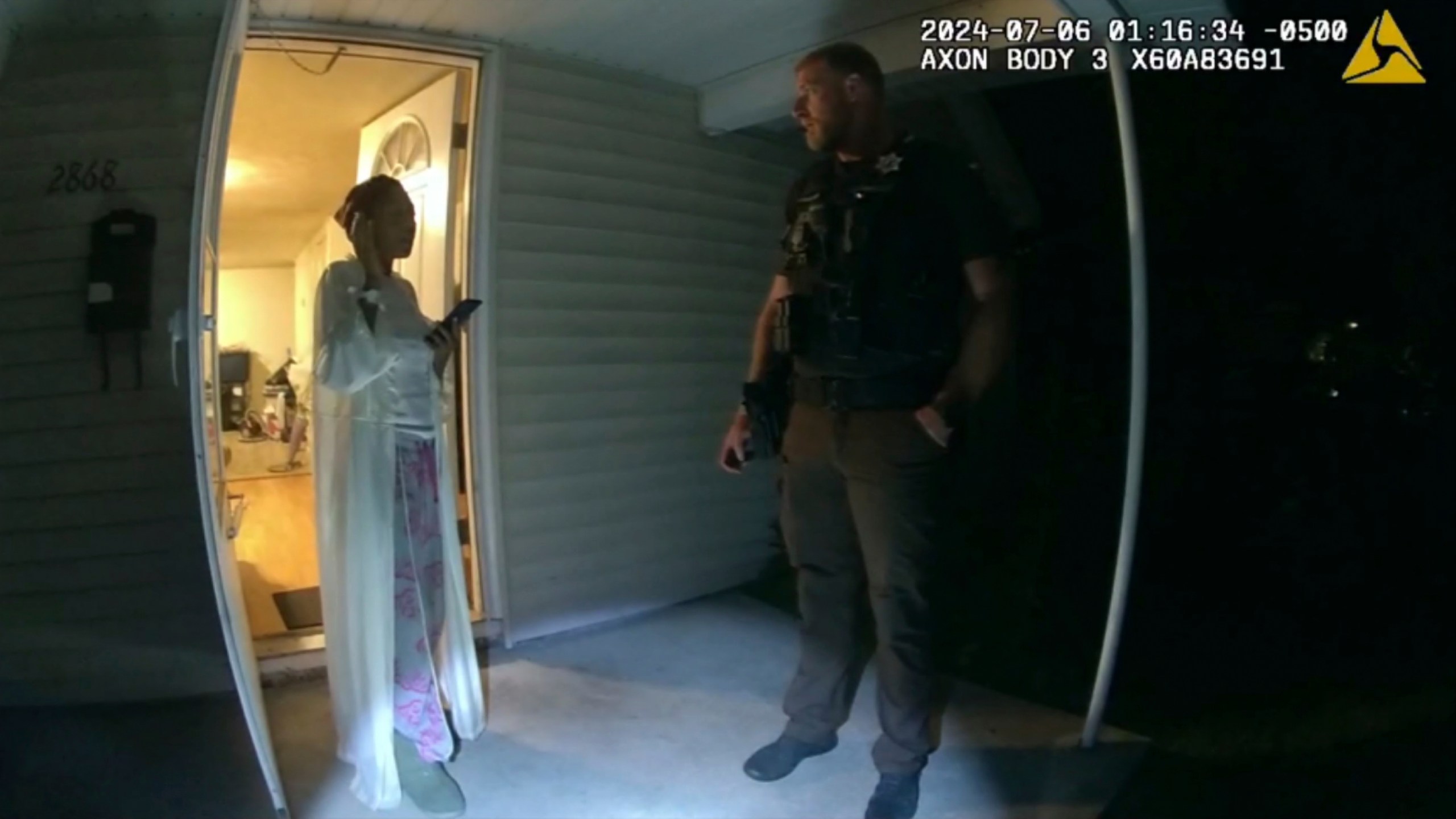 In this image taken from body camera video released by Illinois State Police, Sonya Massey, left, talks with former Sangamon County Sheriff’s Deputy Sean Grayson outside her home in Springfield, Ill., July 6, 2024. Footage released Monday, July 22, by a prosecutor reveals a chaotic scene in which Massey, who called 911 for help, is shot in the face in her home by Grayson. (Illinois State Police via AP)