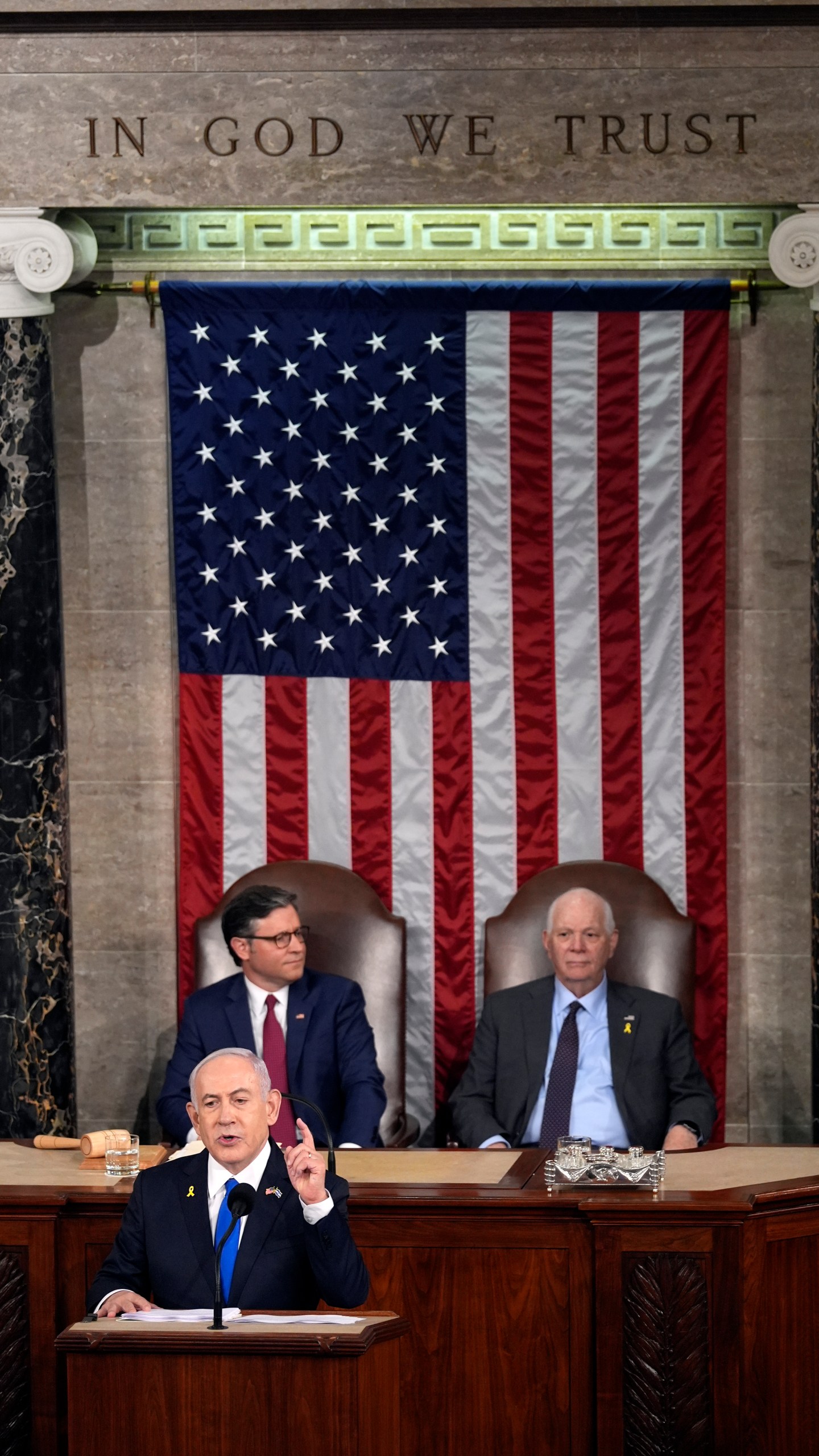 Israeli Prime Minister Benjamin Netanyahu speaks to a joint meeting of Congress at the Capitol in Washington, Wednesday, July 24, 2024, as House Speaker Mike Johnson of La., and Senate Foreign Relations Chair Ben Cardin, D-Md., watch. (AP Photo/Julia Nikhinson)