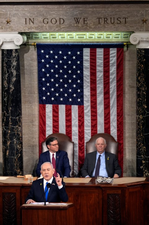 Israeli Prime Minister Benjamin Netanyahu speaks to a joint meeting of Congress at the Capitol in Washington, Wednesday, July 24, 2024, as House Speaker Mike Johnson of La., and Senate Foreign Relations Chair Ben Cardin, D-Md., watch. (AP Photo/Julia Nikhinson)