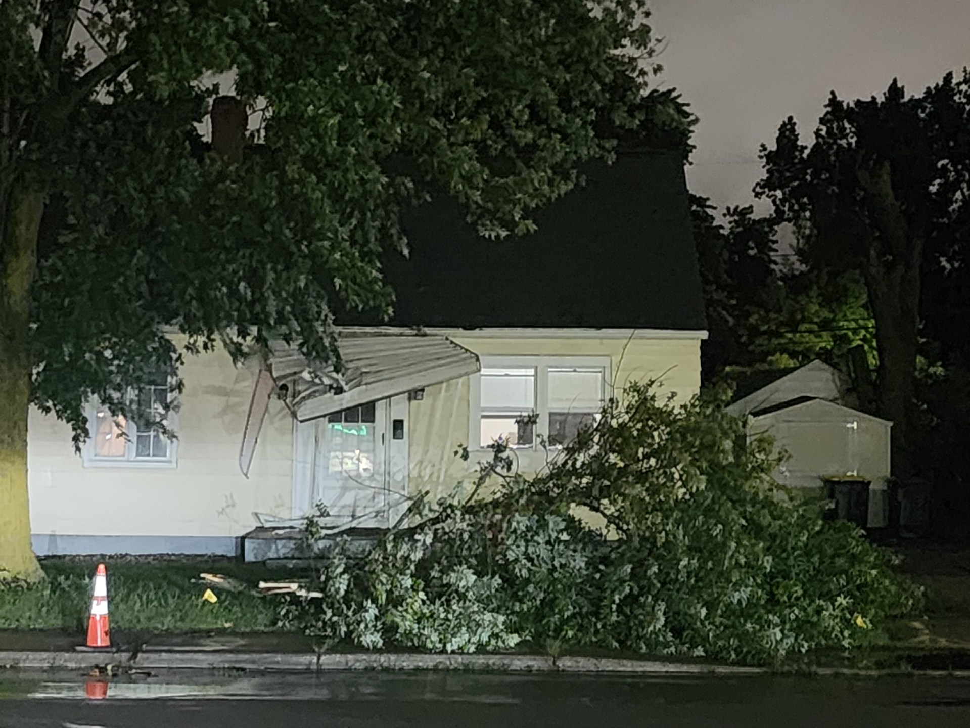 Damage on a State Blvd porch in Fort Wayne, Indiana, after severe storms tore through the area on July 15, 2024.