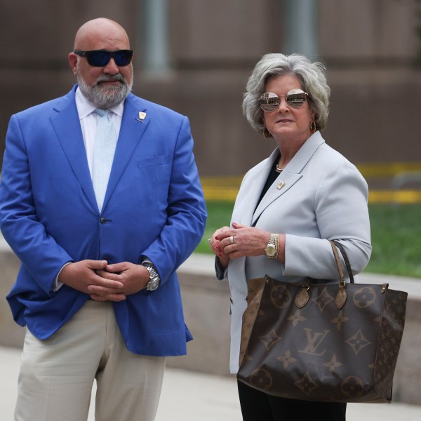 A photo of senior strategists for former President Donald Trump, Susie Wiles, left, and Chris LaCivita.