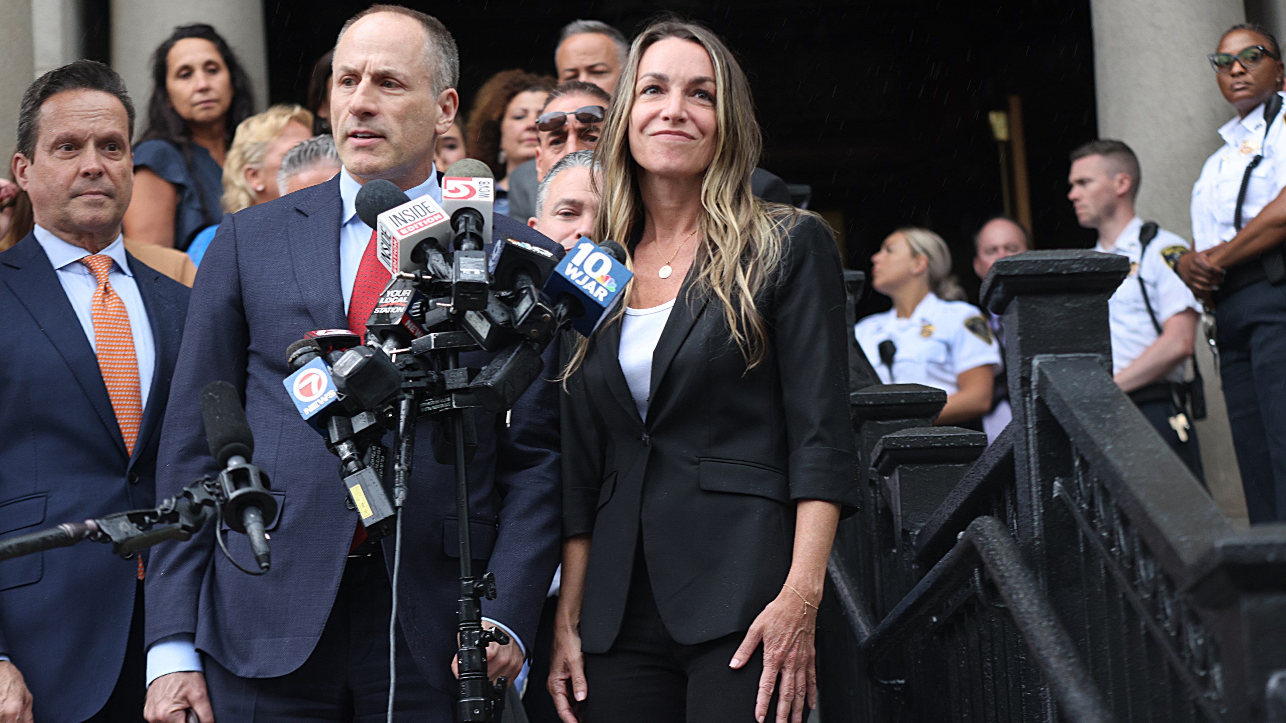 Karen Read and her lawyers address the media in front of Norfolk Superior Court