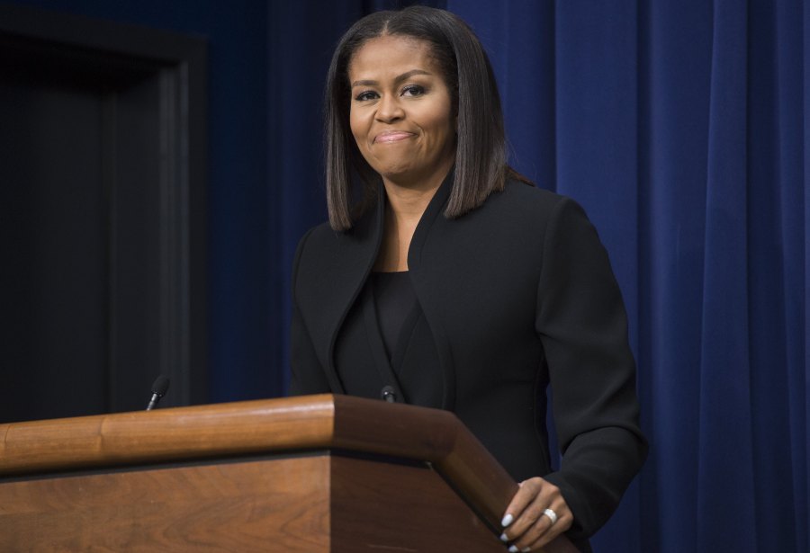 US First Lady Michelle Obama speaks following a screening of the movie, "Hidden Figures," in the Eisenhower Executive Office Building adjacent to the White House in Washington, DC, December 15, 2016.