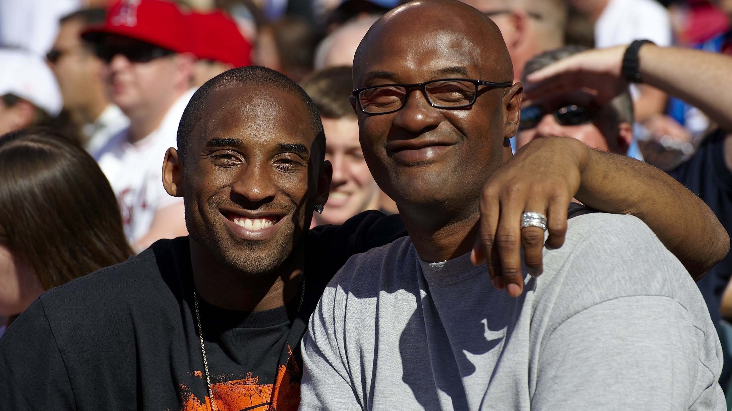 Closeup of Kobe Bryant with his father Joe Bryant during Los Angeles Angels of Anaheim vs Los Angeles Dodgers game. Anaheim, CA 6/21/2009