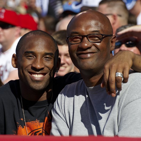 Closeup of Kobe Bryant with his father Joe Bryant during Los Angeles Angels of Anaheim vs Los Angeles Dodgers game. Anaheim, CA 6/21/2009