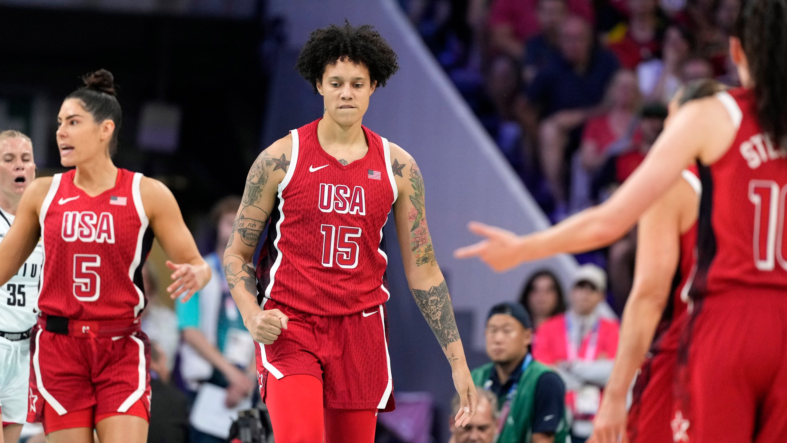 United States' Brittney Griner, center, reacts after being fouled during a women's basketball game against Belgium at the 2024 Summer Olympics, Thursday, Aug. 1, 2024, in Villeneuve-d'Ascq, France. (AP Photo/Michael Conroy)