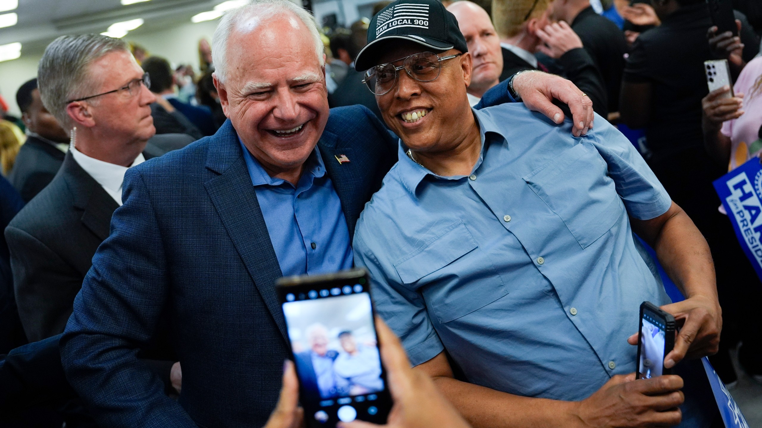 Democratic vice presidential nominee Minnesota Gov. Tim Walz meets union members during a campaign rally at UAW Local 900, Thursday, August 8, 2024, in Wayne, Mich., also attended by Democratic presidential nominee Vice President Kamala Harris. (AP Photo/Julia Nikhinson)