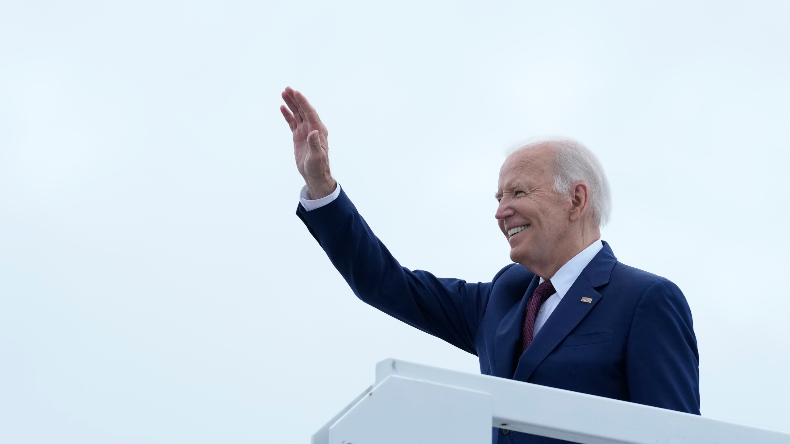 President Joe Biden waves from the top of the steps of Air Force One at Joint Base Andrews, Md., Thursday, Aug. 8, 2024, on his way to Wilmington, Del., to visit with his campaign staff. (AP Photo/Susan Walsh)