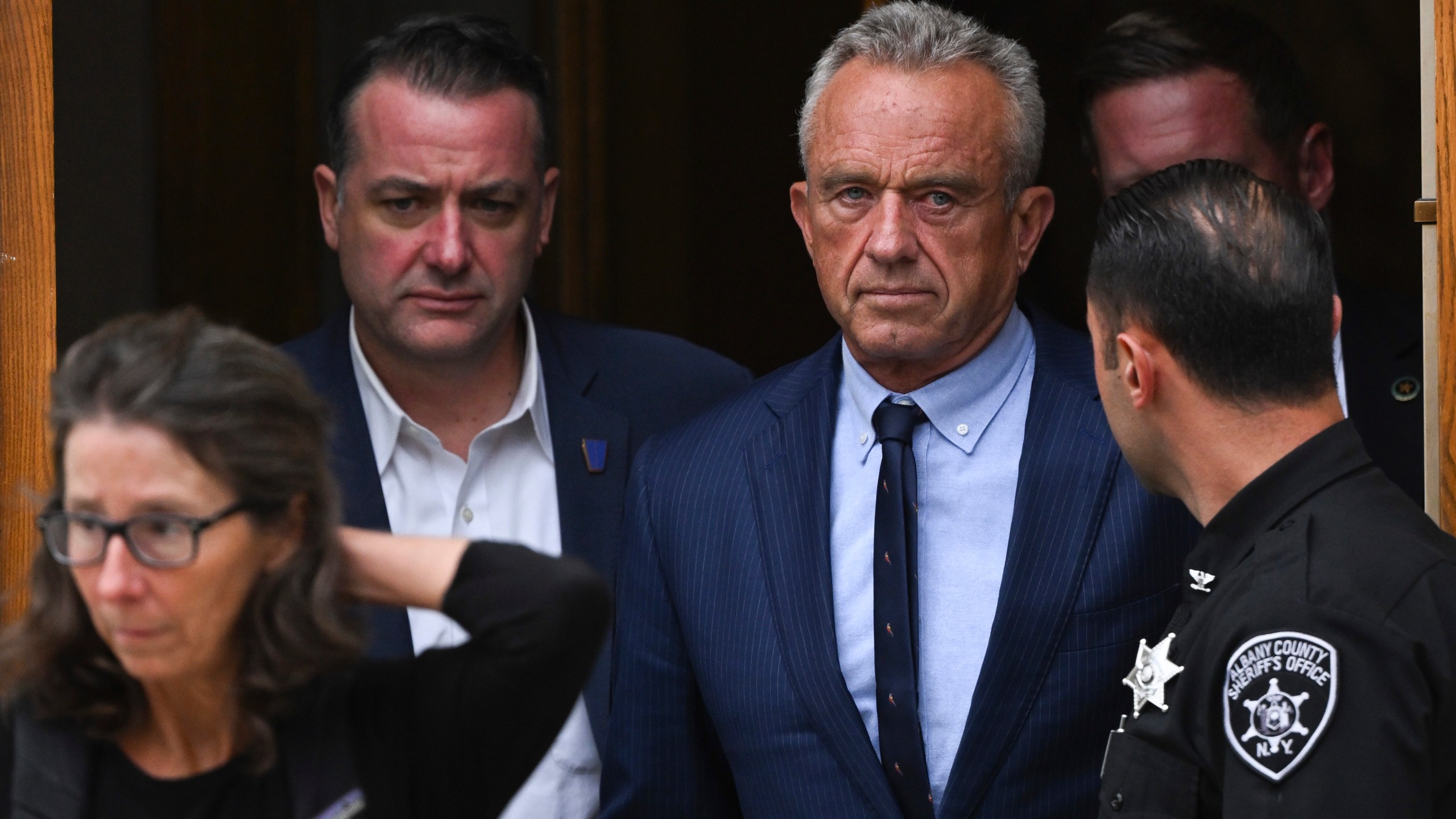 FILE - Independent presidential candidate Robert F. Kennedy Jr., center right, leaves the Albany County Courthouse, Aug. 6, 2024, in Albany, N.Y. (AP Photo/Hans Pennink, File)