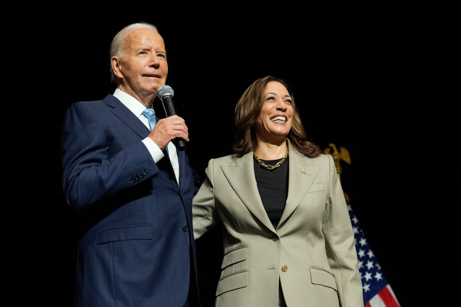 FILE - President Joe Biden, left, and Democratic presidential nominee Vice President Kamala Harris speak in Largo, Md., Aug. 15, 2024. (AP Photo/Susan Walsh, File)