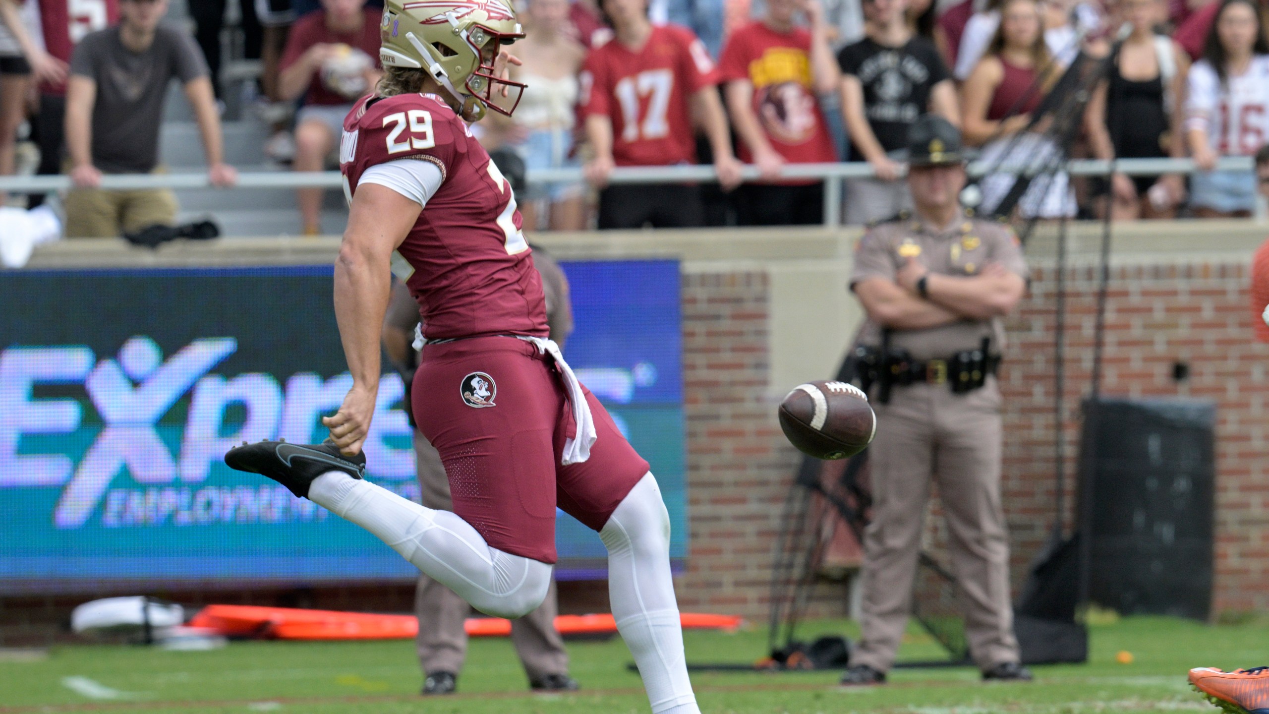 FILE - Florida State punter Alex Mastromanno (29) kicks the ball away during the first half of an NCAA college football game against Syracuse, Saturday, Oct. 14, 2023, in Tallahassee, Fla. (AP Photo/Phelan M. Ebenhack, File)