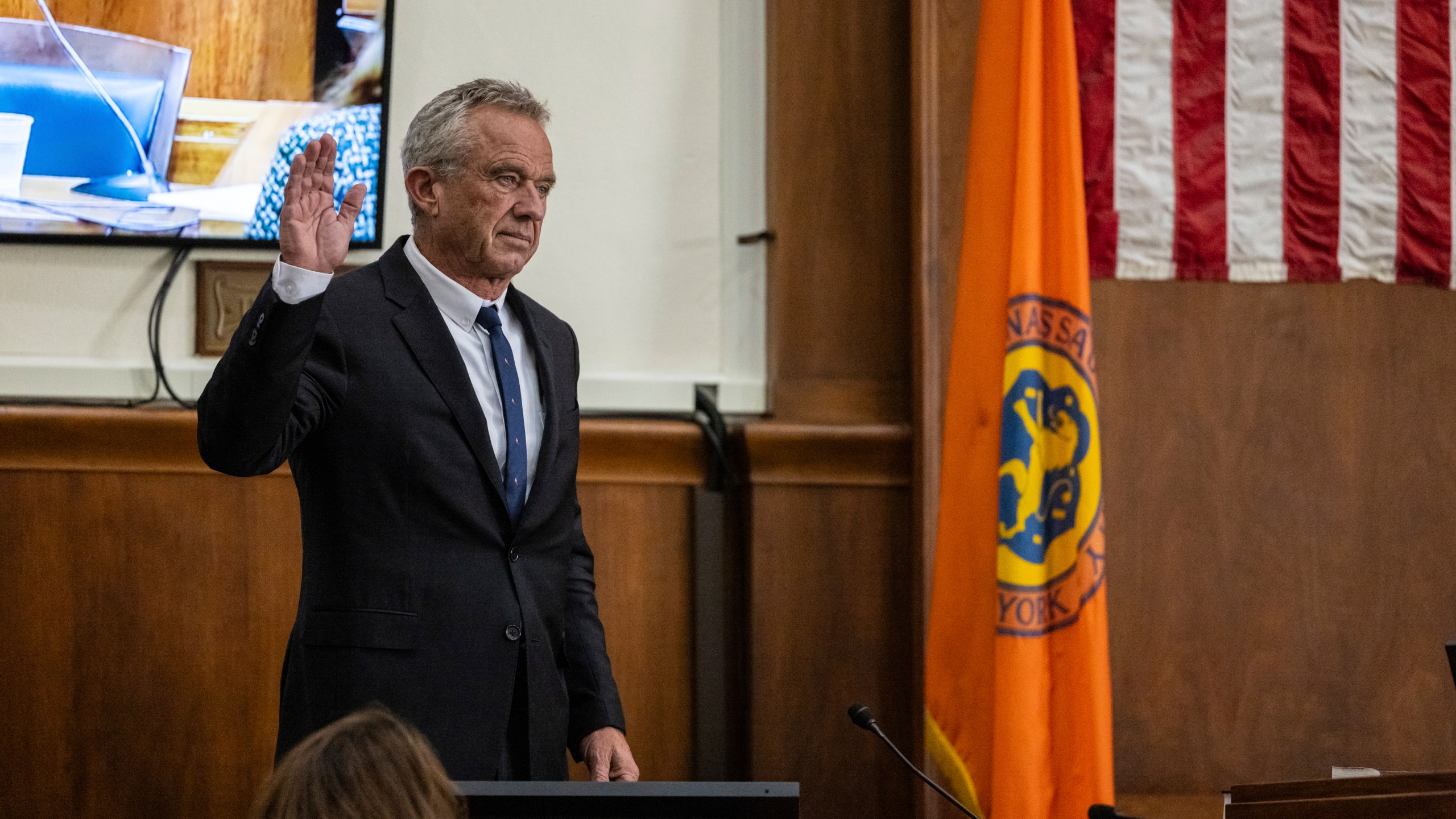 Independent Presidential candidate Robert F. Kennedy Jr. is sworn in prior to giving testimony at the Nassau County Supreme Court in Mineola, N.Y. on Wednesday, Aug. 21, 2024. (AP Photo/Stefan Jeremiah, Pool)