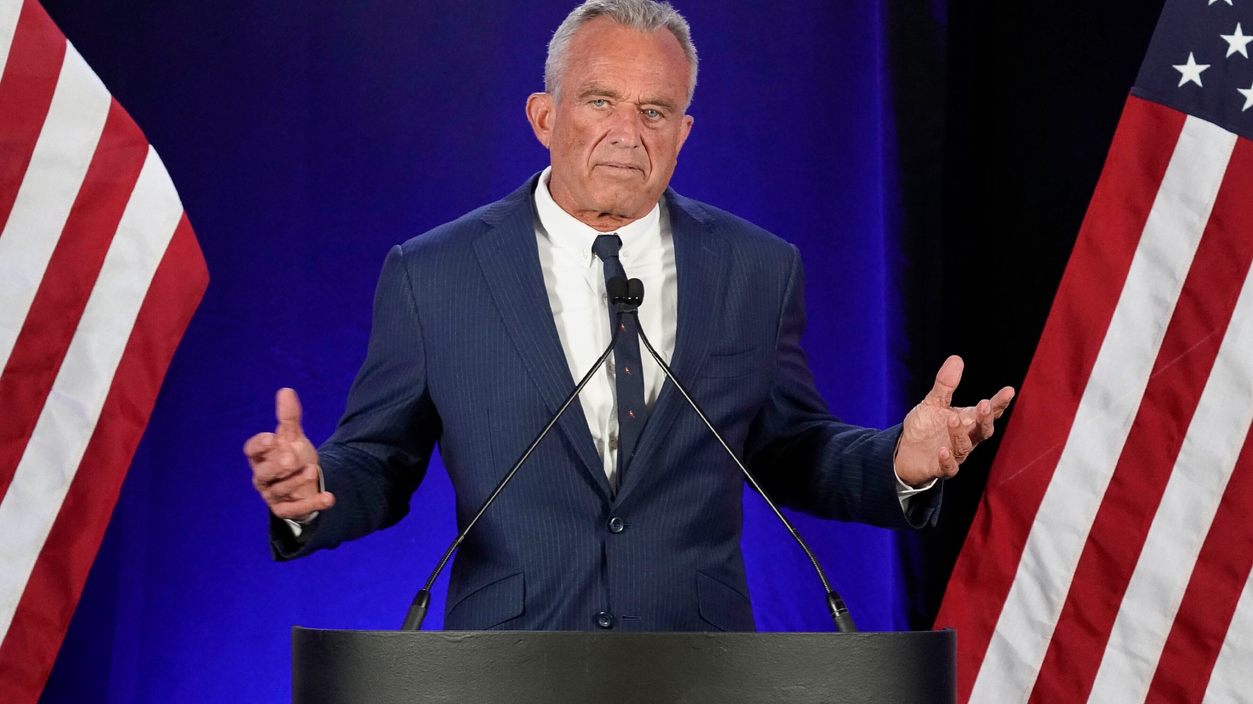 Independent presidential candidate Robert F. Kennedy Jr. announces he is suspending his presidential campaign at a news conference Friday, Aug 23, 2024, in Phoenix. (AP Photo/Darryl Webb)